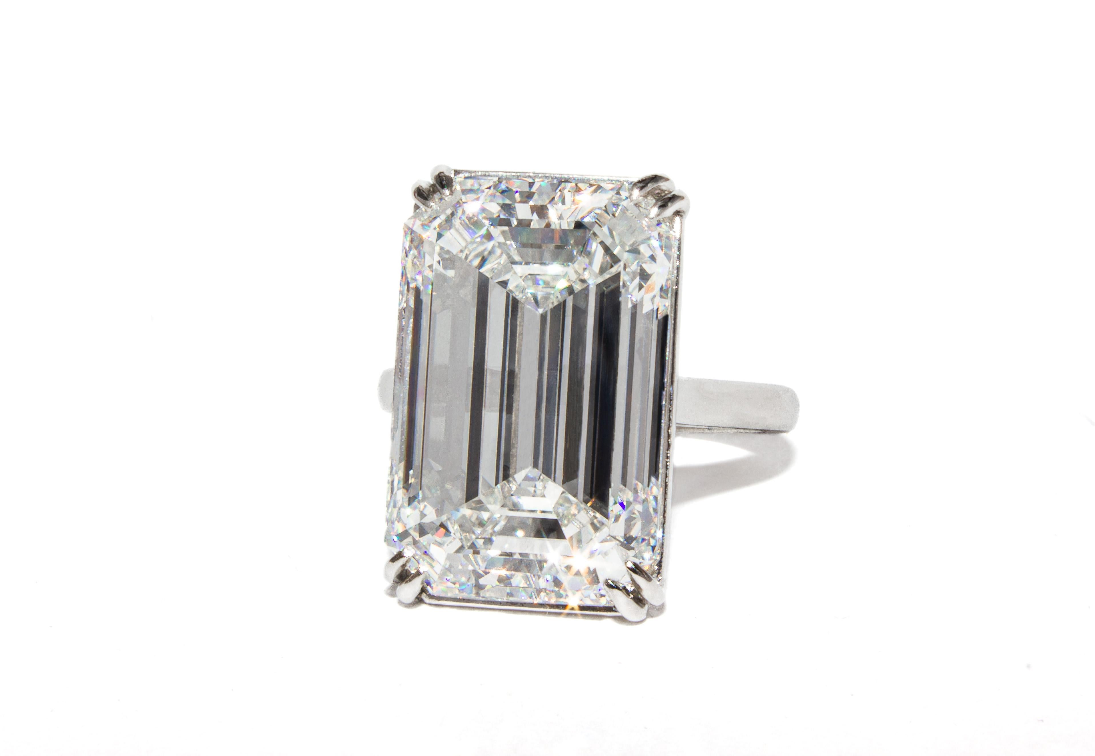 This spectacular platinum solitaire ring is a masterclass in restraint and proportion, designed to showcase an extraordinary center diamond. At its heart is a remarkable 17.88 carat emerald cut diamond, graded G color and VS1 clarity by GIA. The