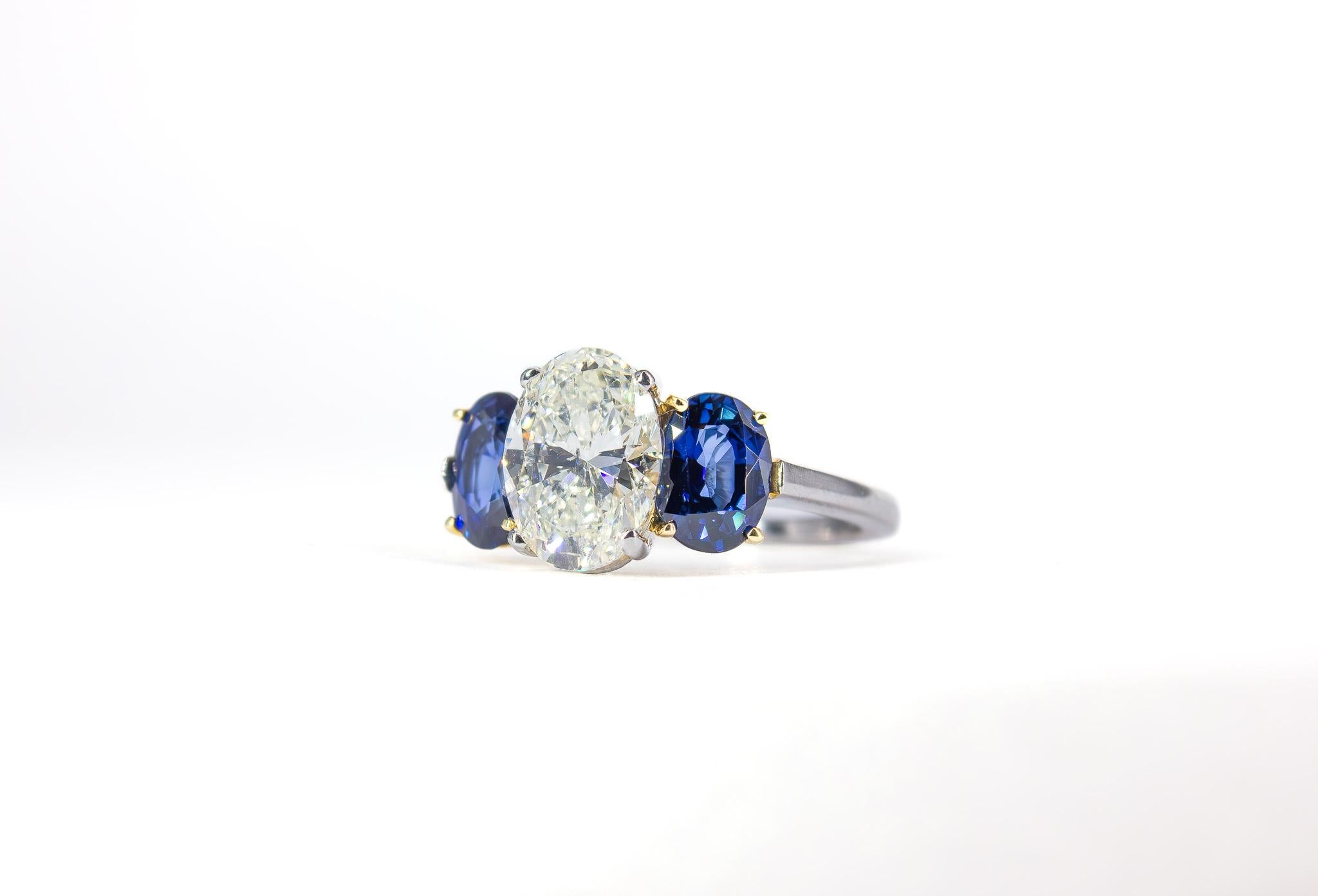 Contemporary J. Birnbach GIA Certified 2.01 Carat Oval Diamond and Sapphire Three-Stone Ring