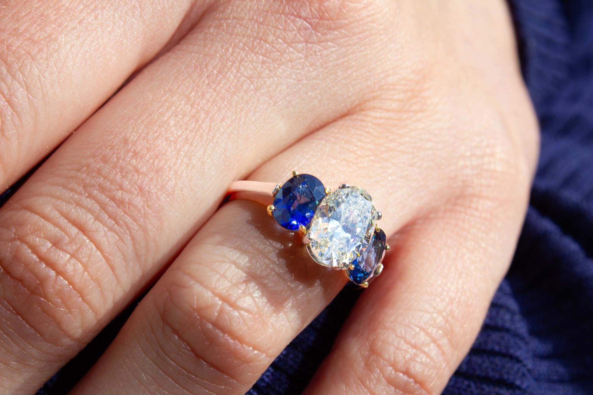 Oval Cut J. Birnbach GIA Certified 2.01 Carat Oval Diamond and Sapphire Three-Stone Ring