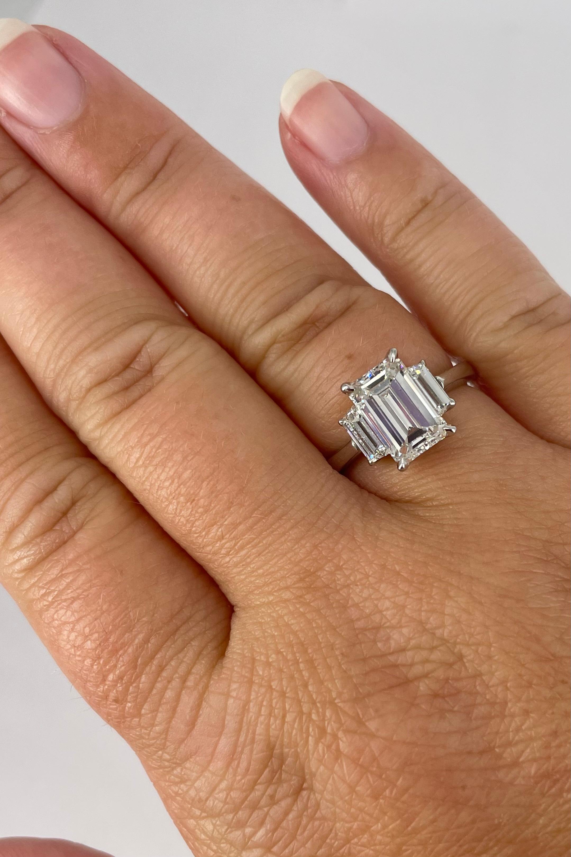 2 carat 3 stone emerald cut diamond ring