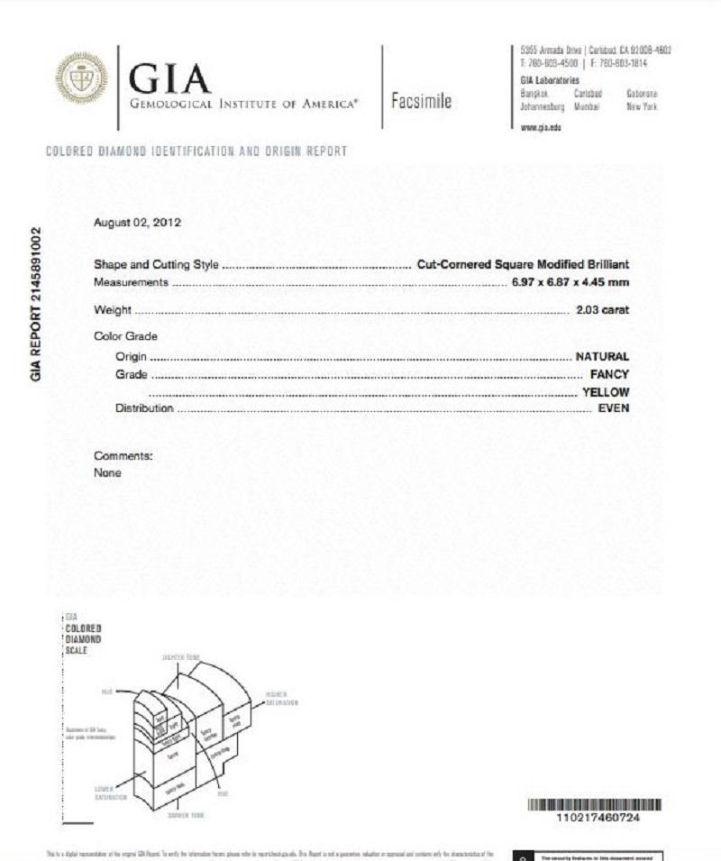 Women's J. Birnbach GIA Certified 2.03 ct Fancy Yellow Radiant Diamond Three Stone Ring For Sale