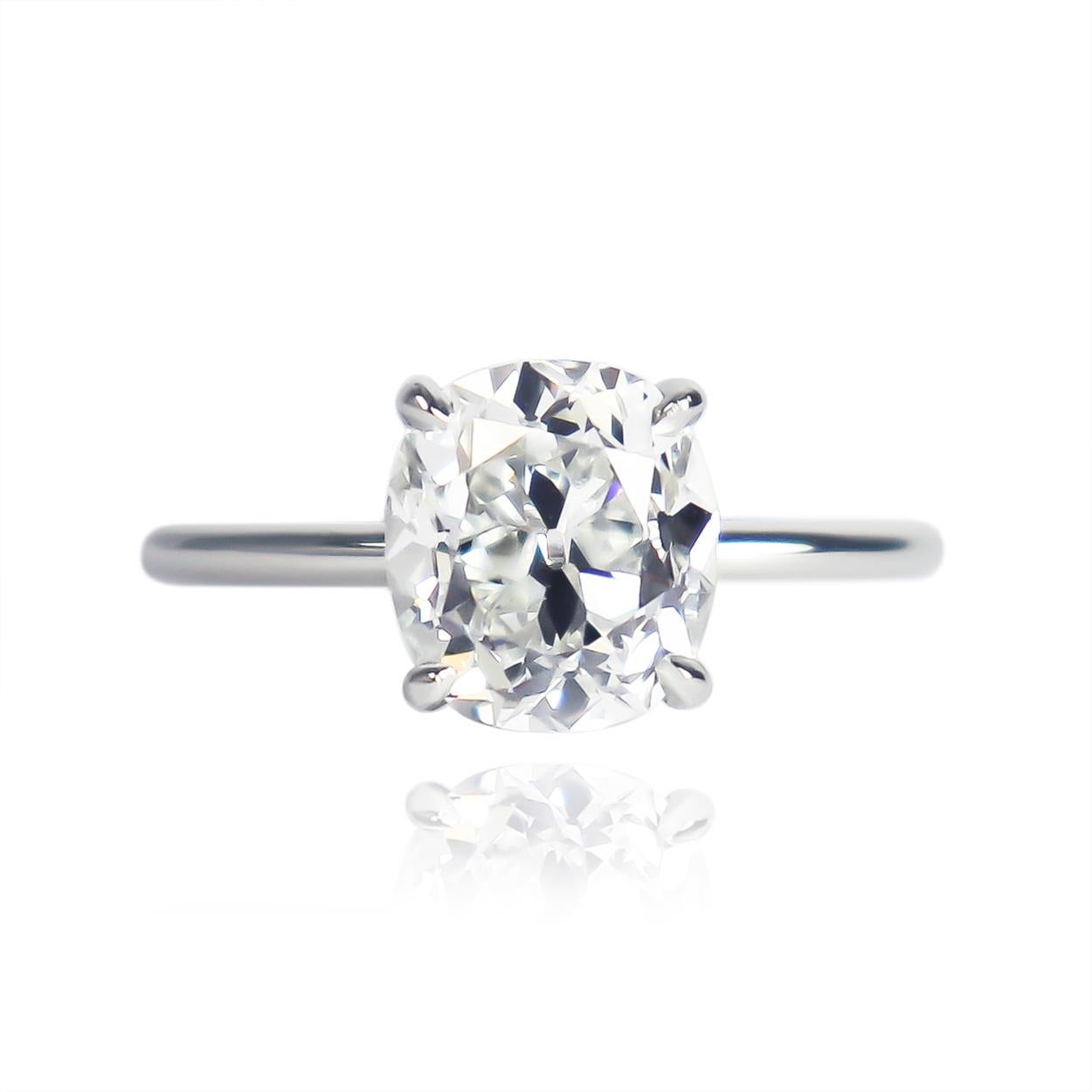 This perfect marriage of contemporary craftsmanship and antique diamond cutting from the J. Birnbach workshop features a 2.13 carat cushion brilliant cut diamond of G color and VS2 clarity... Set in a sleek, platinum, solitaire ring with a flush-fit