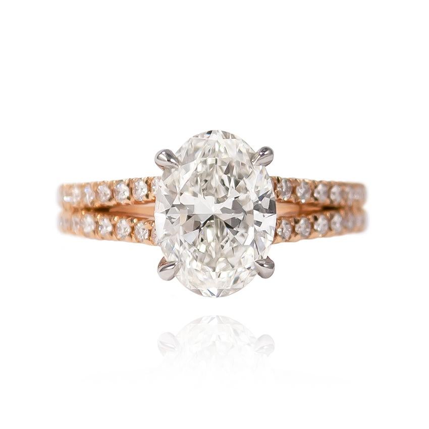 J. Birnbach is showcasing a ring is fit for royalty! Featuring a GIA certified 2.21 ct Oval of G color and SI2 clarity, this piece is a huge look for the price... The beautifully-laid out diamond is set in a handmade, 18K two-tone ring mounting with