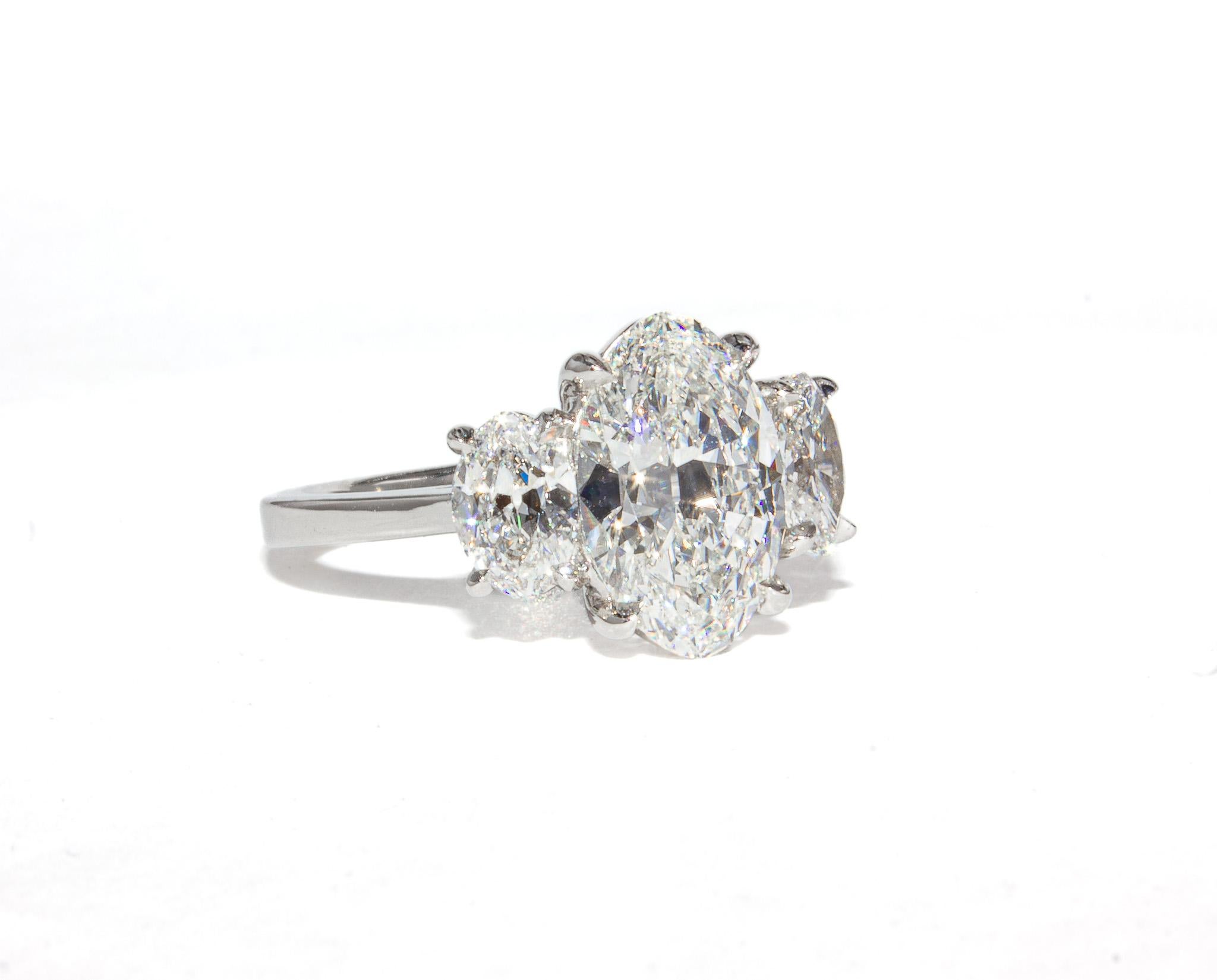 Contemporary J. Birnbach GIA Certified 2.28 Carat G VS1 Oval Diamond Three-Stone Ring For Sale