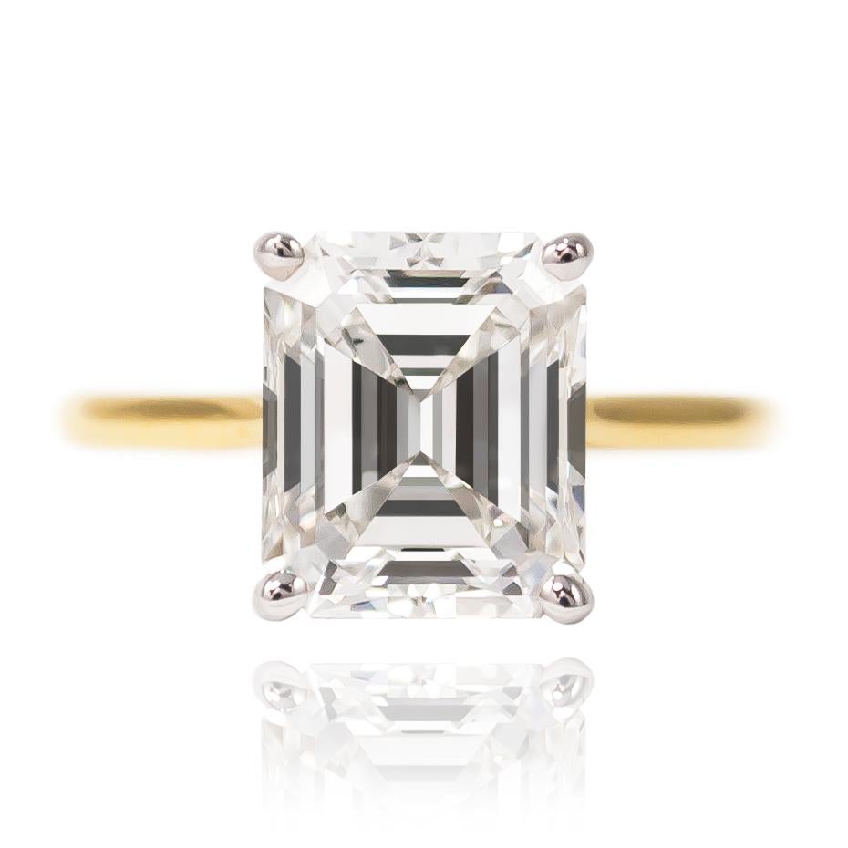 This incredibly sophisticated ring from the J. Birnbach vault features a GIA Certified 2.74 carat Emerald cut diamond of G color and VVS2 clarity. Set in a handmade, 18K two-tone setting, this piece is perfect for those who are looking for classic