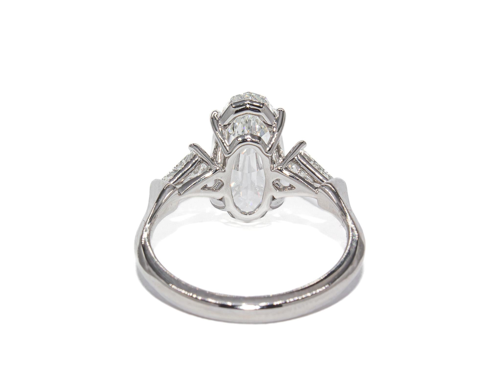 Oval Cut J. Birnbach GIA Certified 3.01 Carat Oval Step Cut Diamond Three-Stone Ring For Sale
