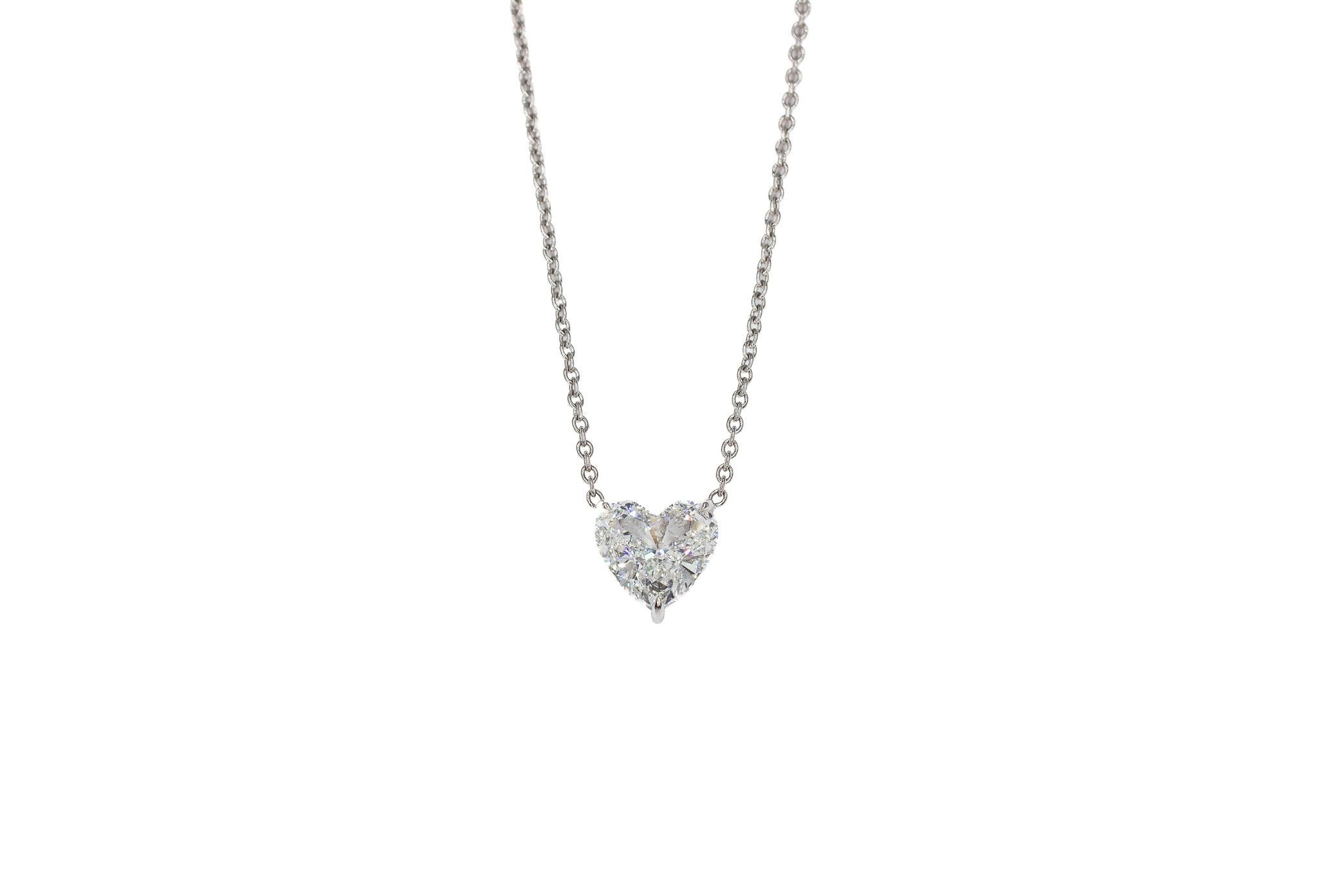 Elegant and romantic, this GIA Certified 3.18 Carat Heart Shape Diamond Pendant Necklace is a timeless symbol of love and beauty. The centerpiece of this exquisite necklace is a stunning 3.18 carat heart-shaped diamond, GIA certified with H color