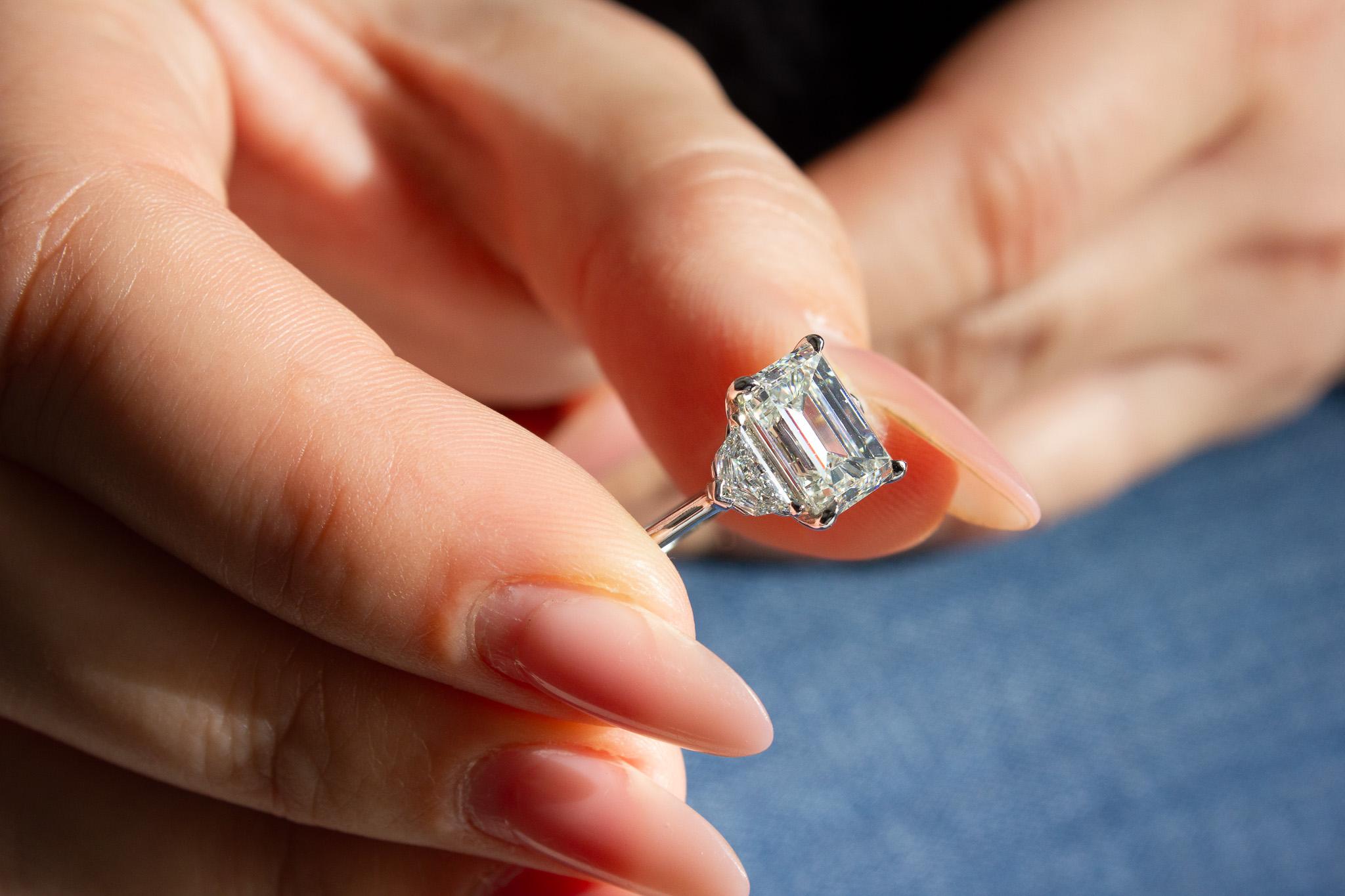 Contemporary J. Birnbach GIA Certified 3.34 Carat Emerald Cut J SI1 Diamond Three-Stone Ring For Sale