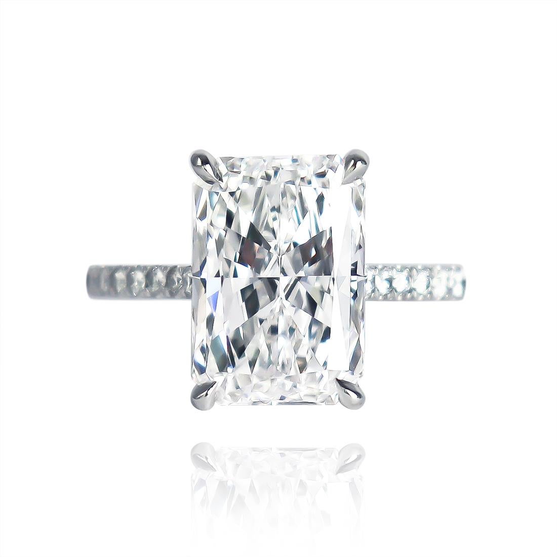 This exquisite ring fresh from the J. Birnbach workshop features a 4.02 carat Radiant cut diamond of E color and VVS2 clarity... Scintillating from every angle, this stone is set in a handmade, platinum ring with pavé details. 

Diamond Ring