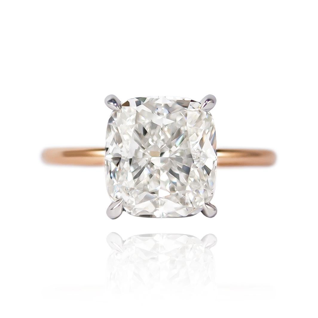 This brand new ring from the J. Birnbach workshop features a 4.50 ct Cushion Modified Brilliant Cut diamond of G color and VS1 clarity, set in a handmade, delicate 18K Rose & White Gold mounting with pavé details = 0.11 ctw.  Contemporary and