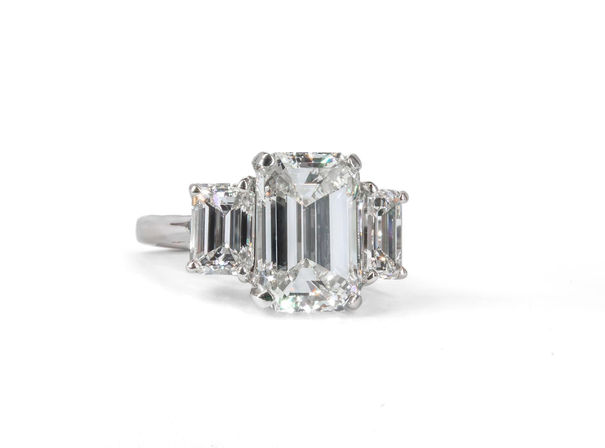 Contemporary J. Birnbach GIA Certified 4.53 Carat Emerald Cut K VS2 Diamond Three-Stone Ring For Sale