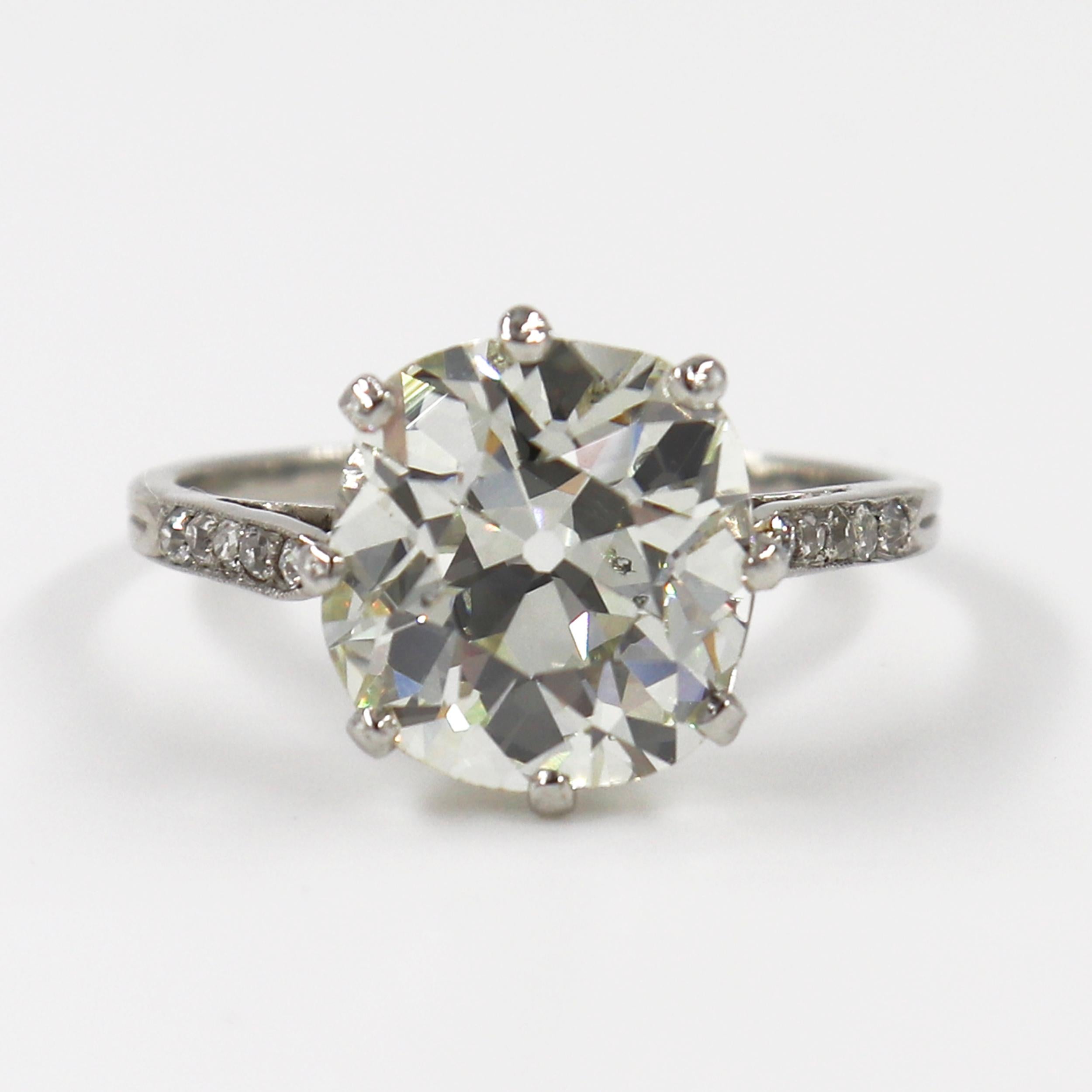 This platinum ring with Bright-Cut Pave features a 4.95ct Old Miner Diamond with L color and SI1 clarity. 

This ring is a size US 7.75 

Purchase includes a GIA Diamond Grading Report 2211417415. Sizing is complimentary with purchase. 

Type:
