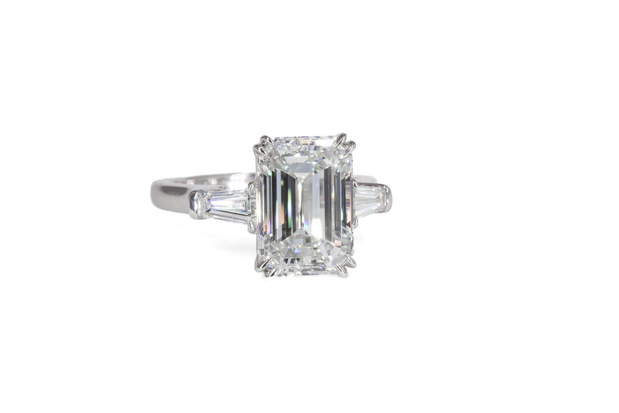 Contemporary J. Birnbach GIA Certified 5.03 Carat Emerald Cut Diamond Three-Stone Ring For Sale