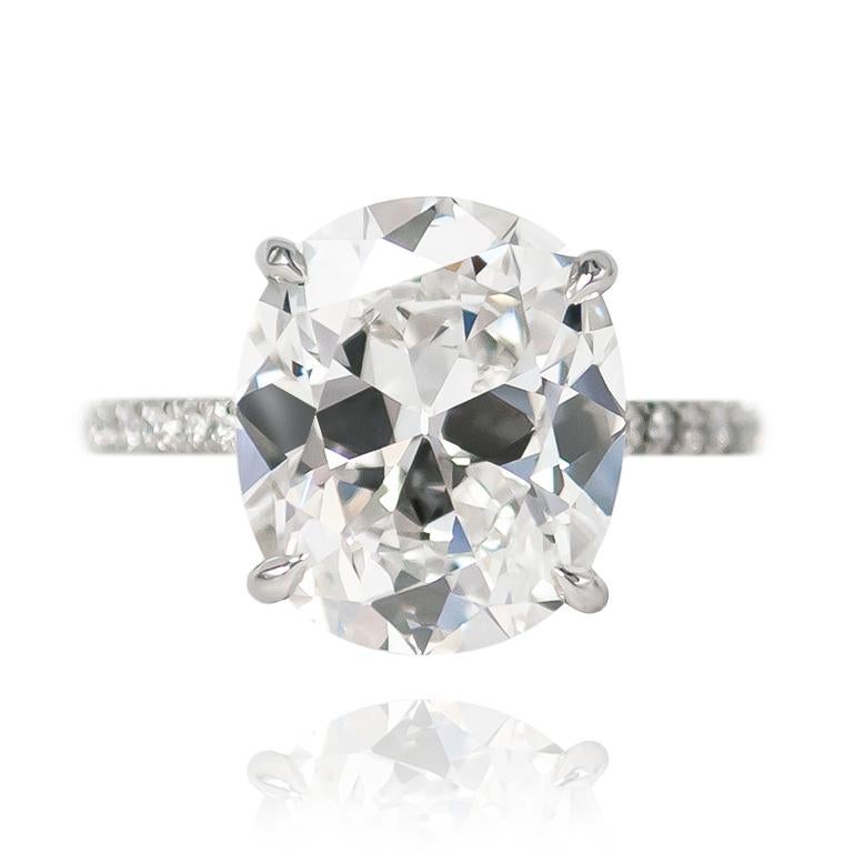 This incredible piece from the J. Birnbach vault features a breathtaking 5.23 ct Cushion Brilliant cut diamond of E color and VS2 clarity. Scintillating at every turn, this stone is set in a handmade, platinum pavé ring with 0.24 ctw of brilliant