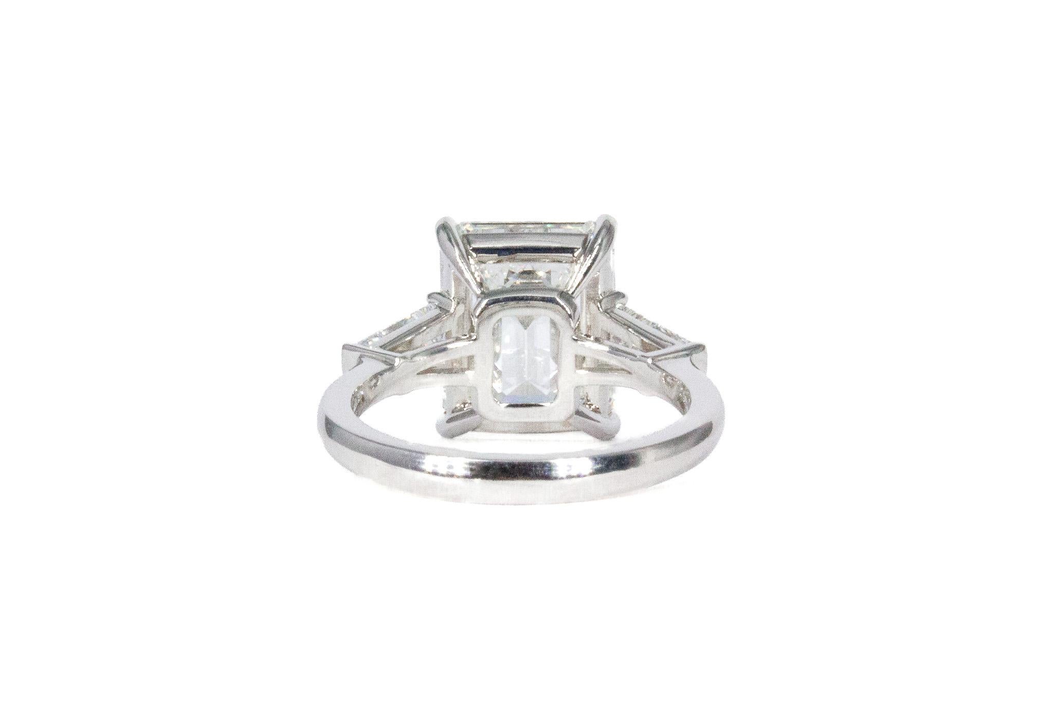 Contemporary J. Birnbach GIA Certified 5.49 Carat Emerald Cut H SI2 Diamond Three-Stone Ring For Sale