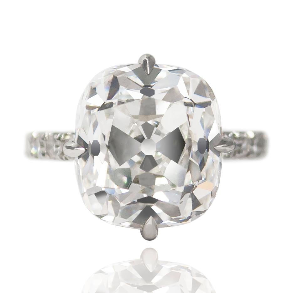 This breathtaking ring from the vaults of J. Birnbach is the essence of charm and sophistication... The handmade, platinum ring features a GIA Certified 7.01 ct Old Miner Diamond of G color and SI1 clarity. With North, South, East, & West style