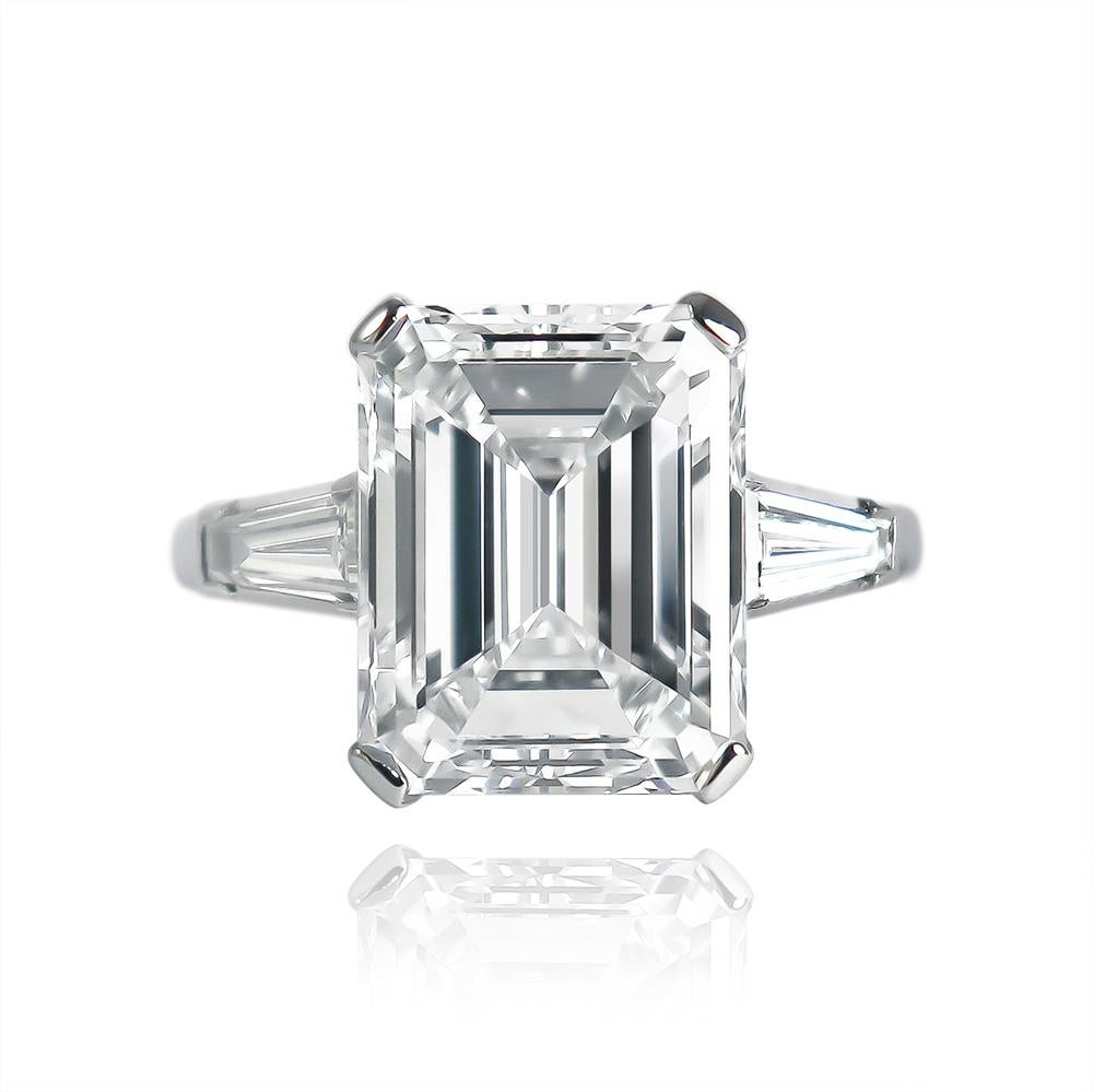 An exquisite execution of a classic, this platinum emerald cut diamond engagement ring by J. Birnbach is stunning! The ring features an impressive 7.20 carat emerald cut diamond graded by GIA as F color and VVS2 clarity. It is a beautiful