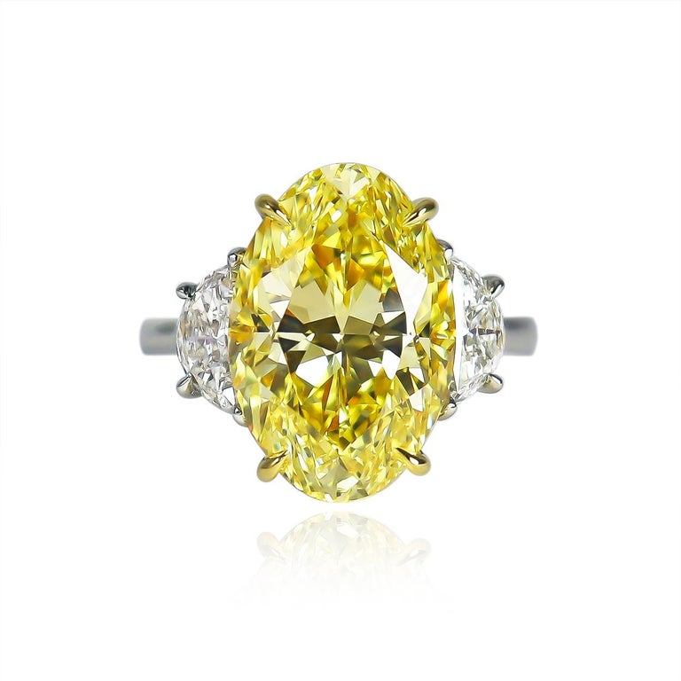 This incredible diamond fresh from the J. Birnbach cutting workshop features an 8.01 carat oval brilliant cut diamond of Fancy Intense Yellow color and VVS2 clarity. With even color distribution, no fluorescence, and a beautiful outline /