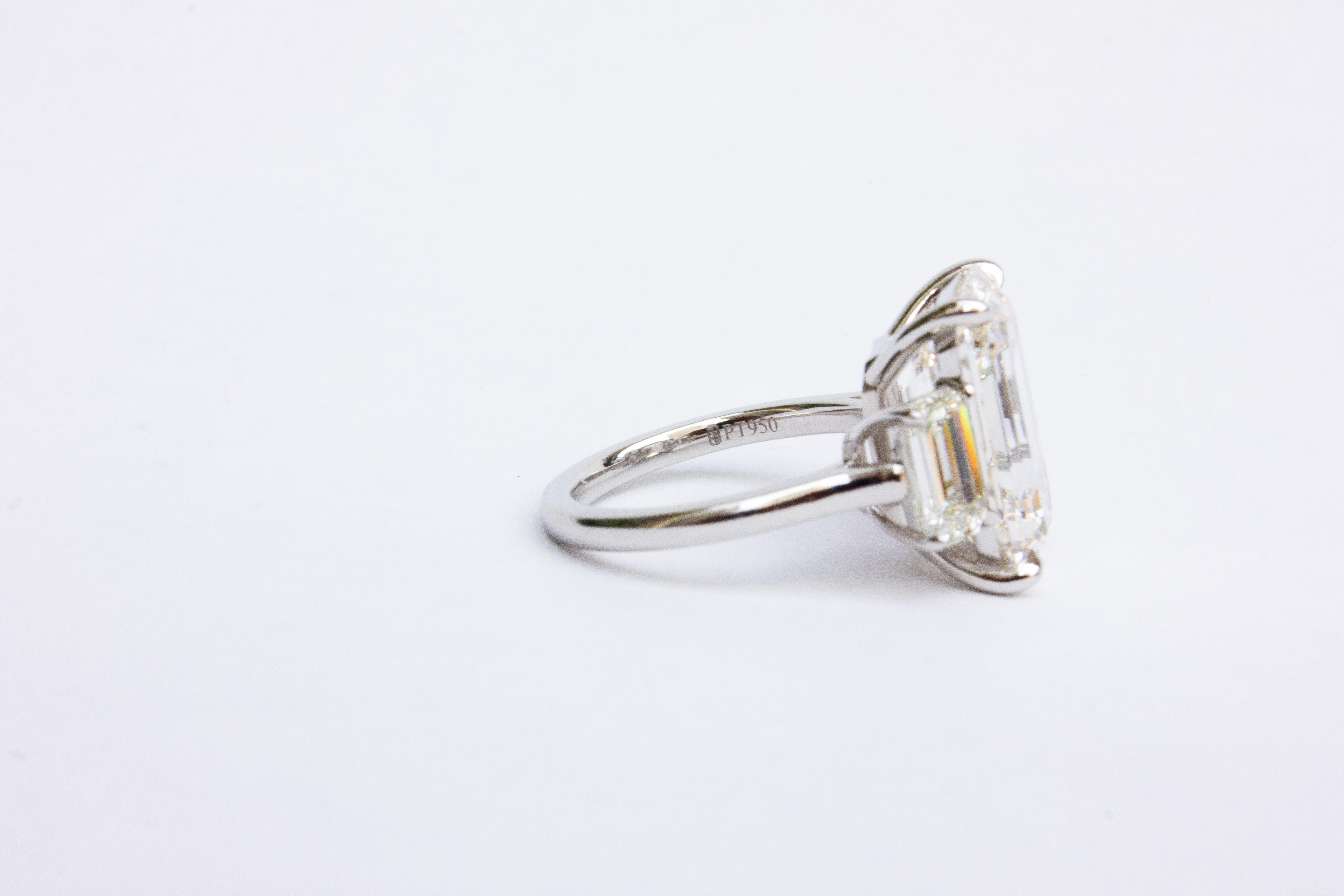 Contemporary J. Birnbach GIA Certified 8.04 Carat Emerald Cut Diamond Three-Stone Ring For Sale