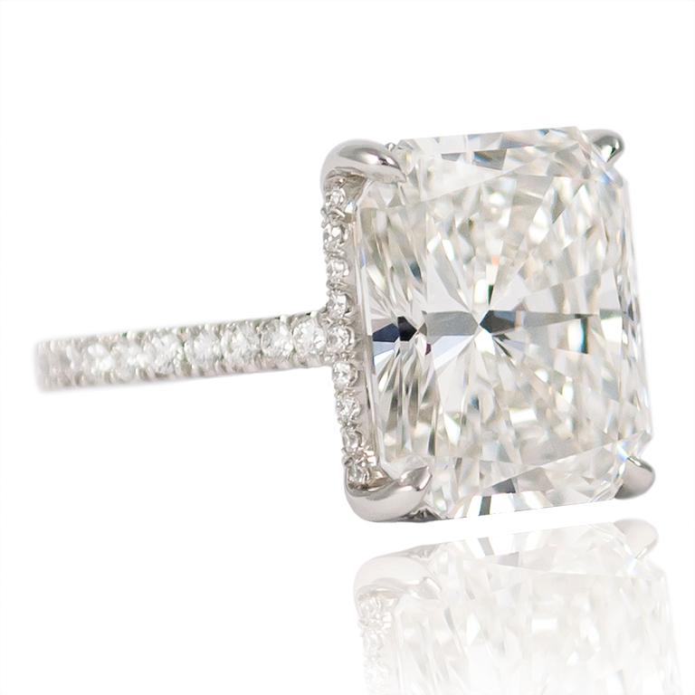 Featuring a J. Birnbach GIA Certified 9.28 carat Radiant cut diamond mounted in a delicate pave ring, this breathtaking one-of-a-kind piece will be sure to delight for decades to come. Purchase includes original GIA Certificate #12228530 which