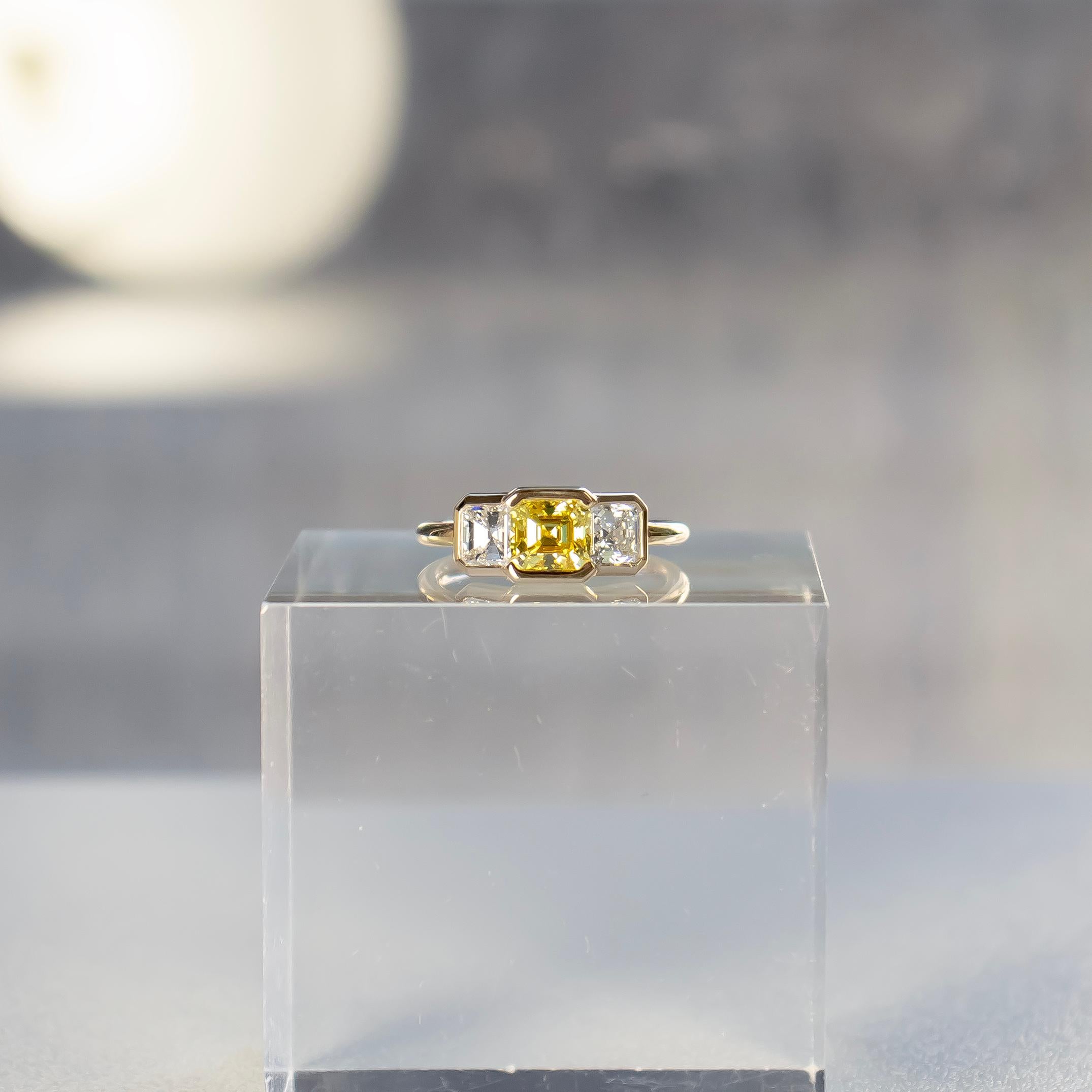 Contemporary J. Birnbach GIA Certified Three-Stone White & Fancy Intense Yellow Diamond Ring For Sale
