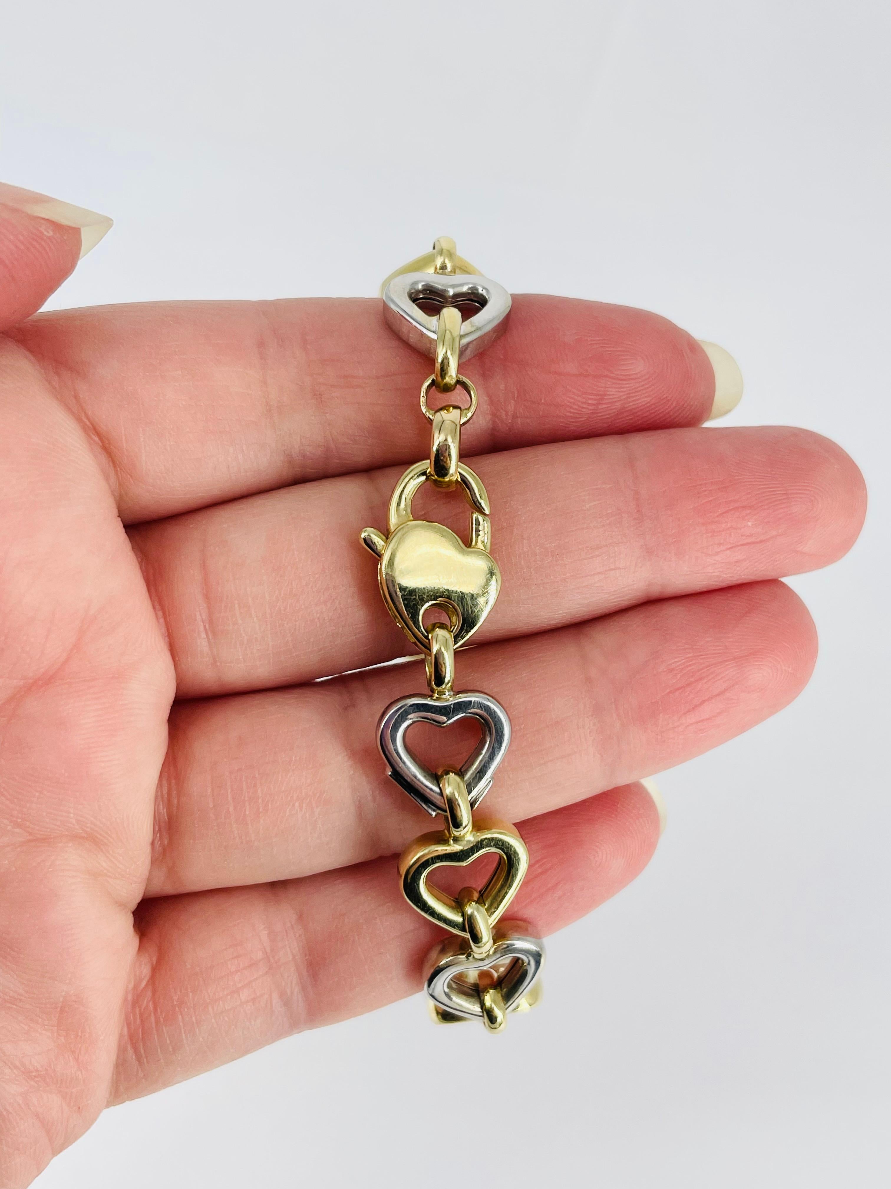 This sweet bracelet is perfect with every outfit! Crafted in 14K white and yellow gold, the alternating open heart and oval links add texture and movement. The heart shaped lobster clasp is a sweet detail that adds to the charm of the piece.