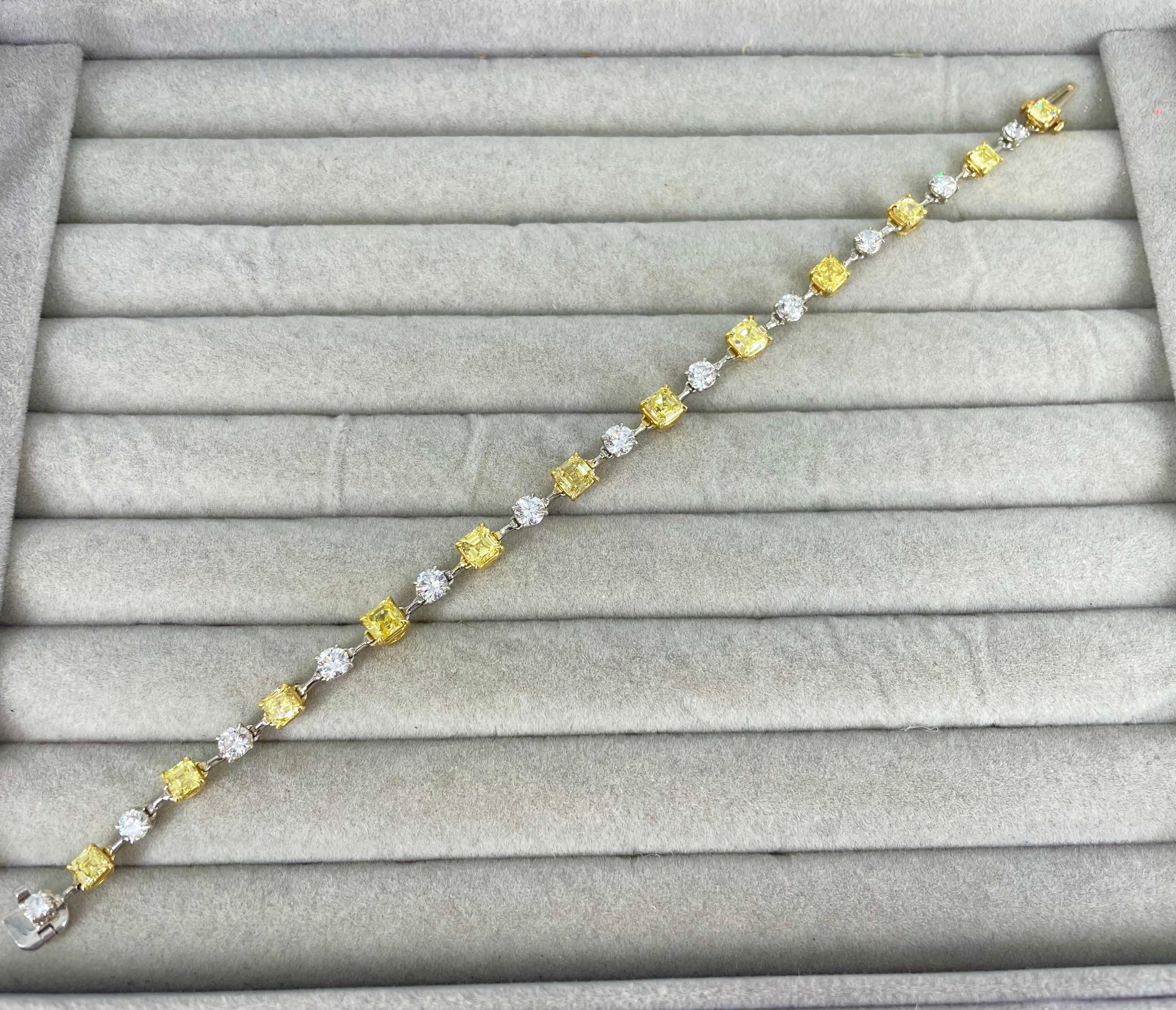 This exceptional yellow and white diamond bracelet by J. Birnbach is a sophisticated and unique way to add yellow diamonds to your jewelry wardrobe! Featuring 6.18 carats of fancy intense yellow asscher cuts that alternate with 2.39 carats of white