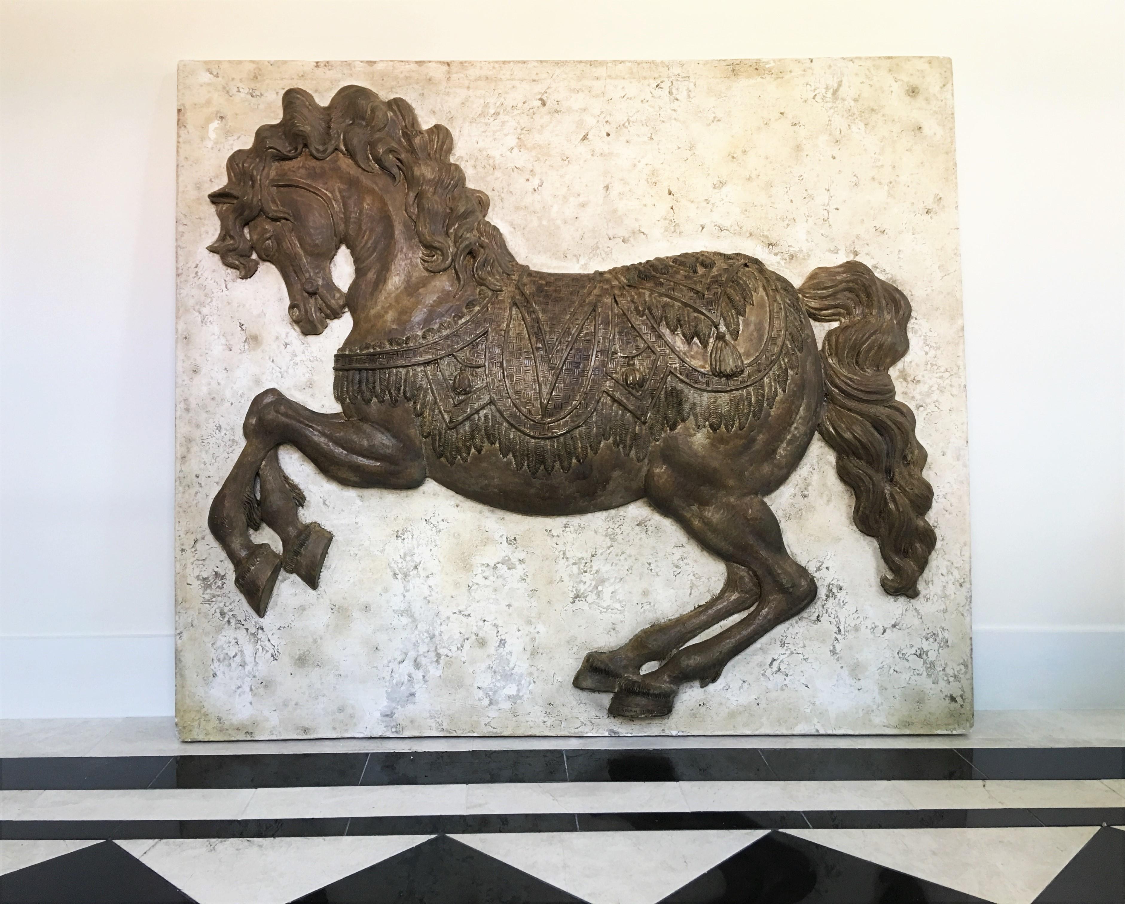 One-of-a-kind plaster wall panel by Harold Studios, Inc. circa 1950s. The highly detailed hanging sculpture depicts a raised molded detailed running horse and will make a dramatic impact wherever it is employed. There are hooks on the back so you