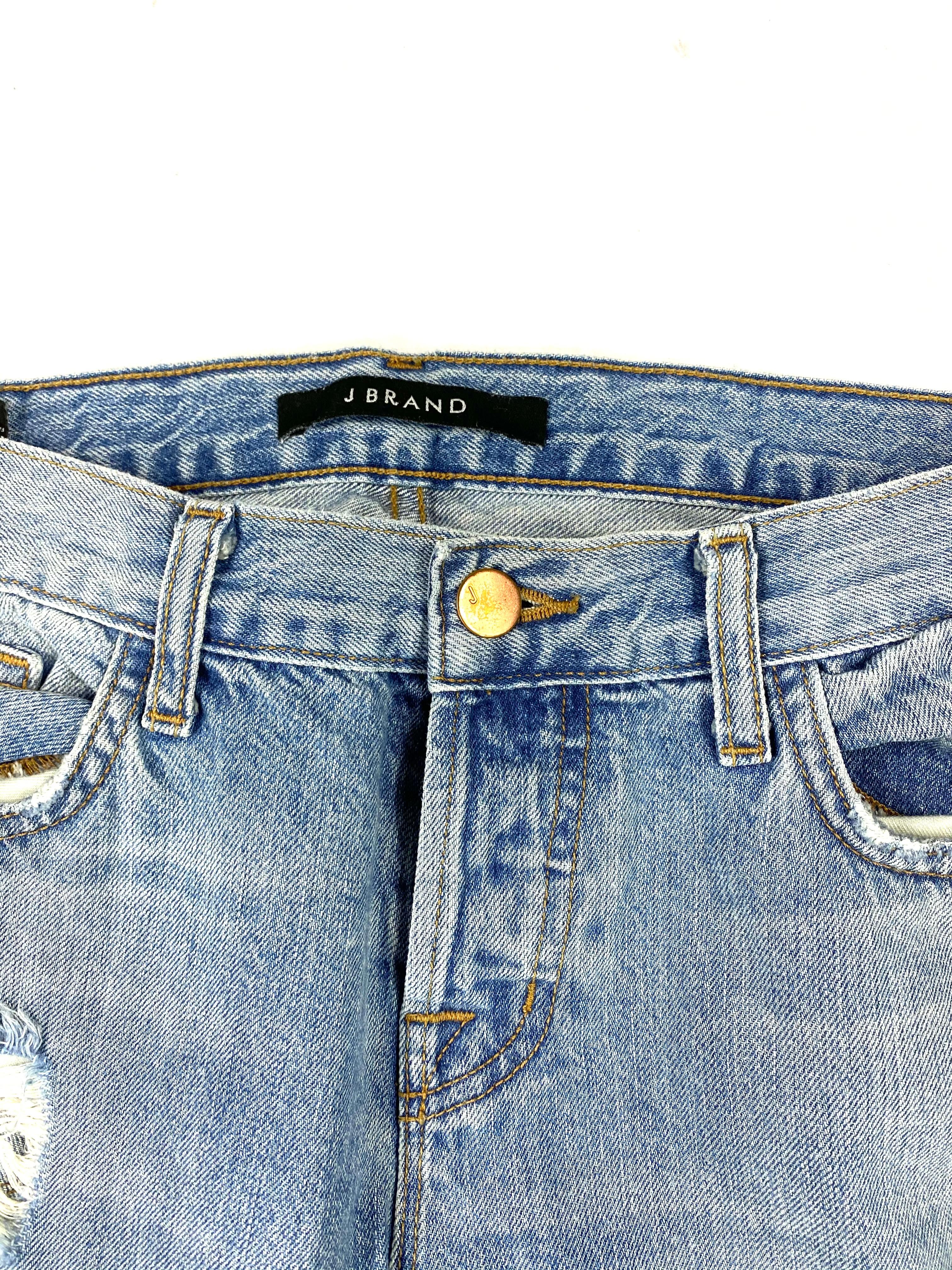 Product details:

The jeans feature light blue wash, straight fit with distressed details on the front.