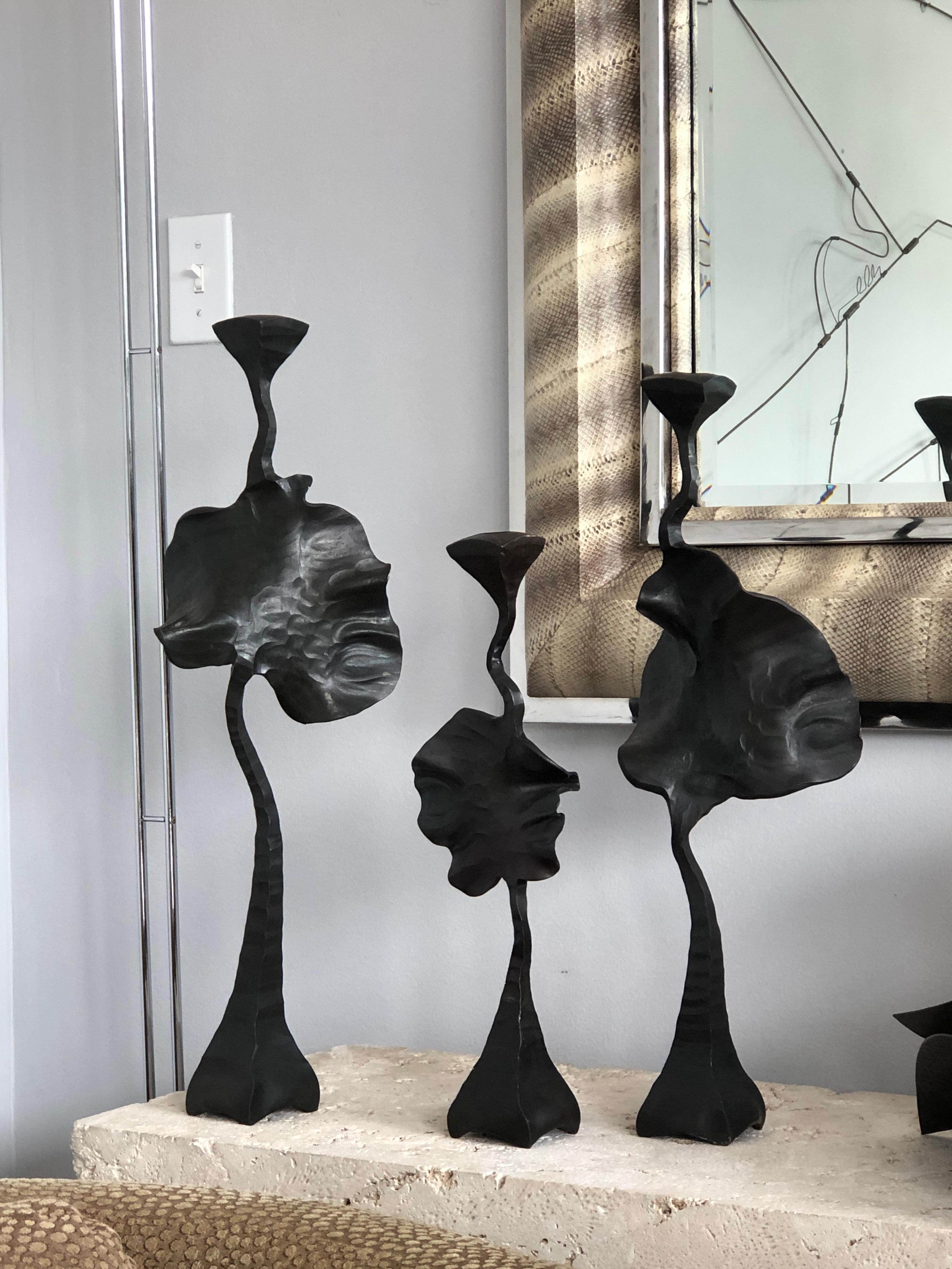 A set of 3. These are hammered steel with a black patina. The shape is quite unique. Outstanding craftsmanship. All signed on bottom.