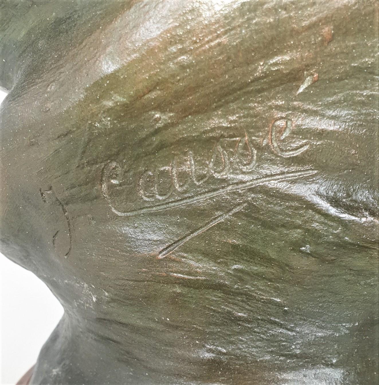 Large bust of a woman, flowers in her hair, in bronze with double patina, on a wooden base

This sculpture is signed J Caussé (Julien, 1869-1914) on one side: this French artist was a pupil of Alexandre Falguière , and has received several awards