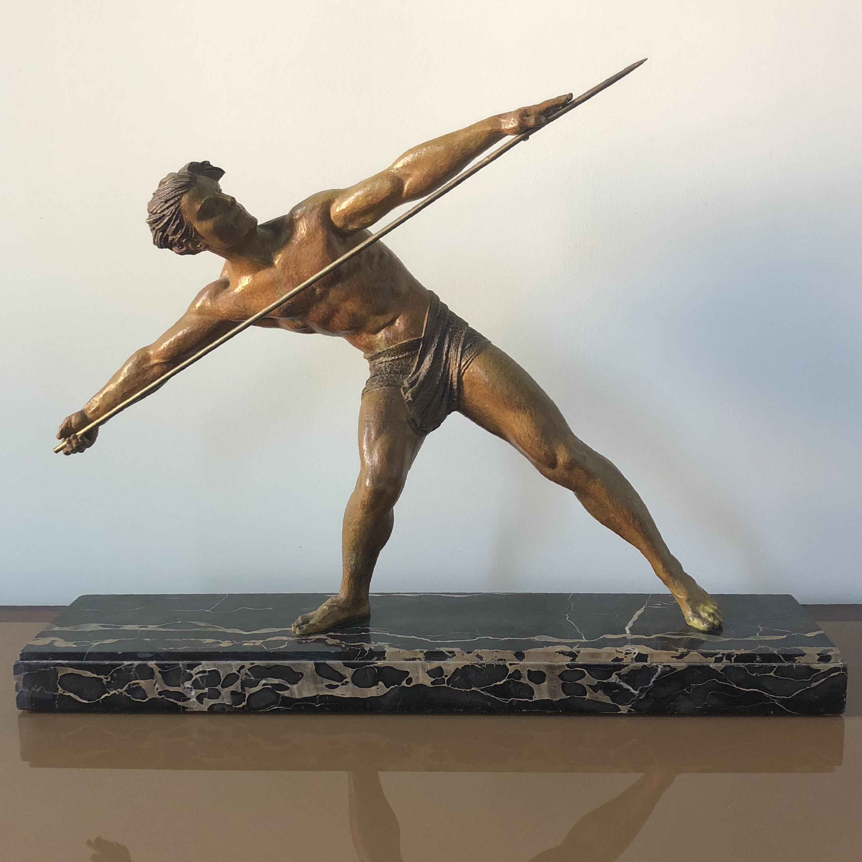 Sculpture in cast iron, Launcher Javelot on portoro marble base. The javelin is in bronze. Signed J. Darcourt. 
Sculpture patina green ocher in good condition.
 