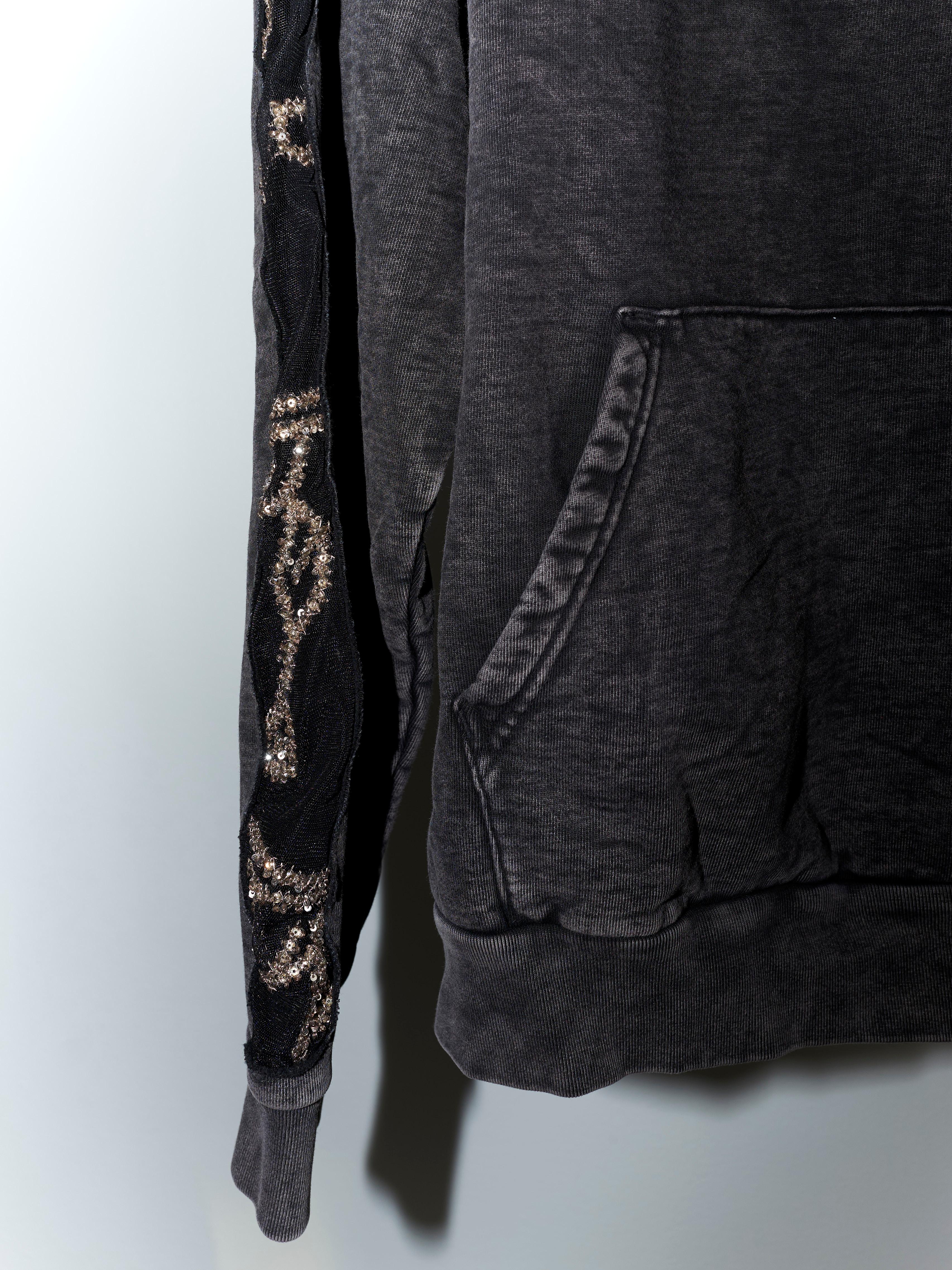 Brand: J Dauphin
Embellished J Dauphin - Black Stone Wash Hoodie Organic Cotton 
Material: 100% Organic Cotton 
Embellished Sleeve

J Dauphin was created 2006 by Swedish French Johanna Dauphin. She started her career working for LVMH owned Fend at