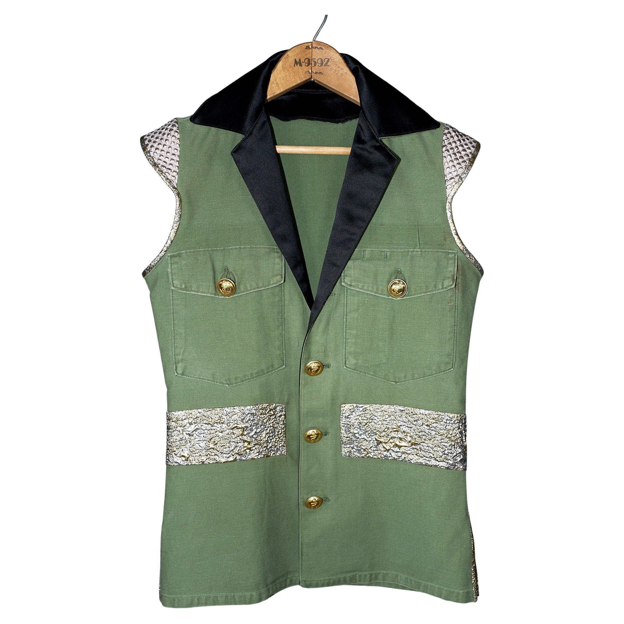 Designer J Dauphin 
Repurposed Us Fatigue Military Sleeveless Vest Jacket 
Trims: Italian Black 100% Silk Satin and Silver Gold Metallic Brocade
Vintage French Military Brass Buttons
Size: Small 


Designer: J Dauphin
Sustainable Luxury, Collectible