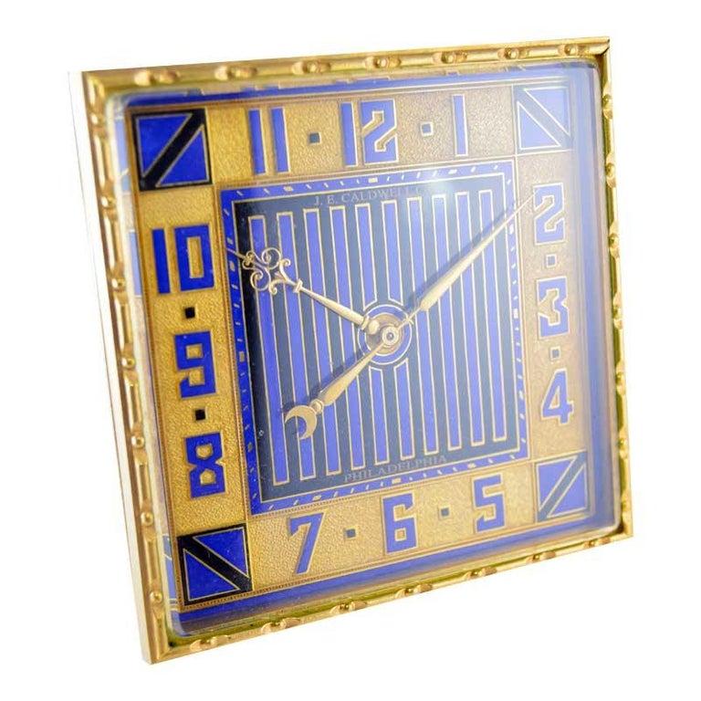Factory / house: J. E. Caldwell
Style / reference: Art Deco
Metal / material: gilded finish with kiln fired enamel inlay
Circa / year: 1930's
Dimensions / size: 4 inche x 4 inch x 2 inch angle
Movement / caliber: manual winding / 15 jewels
Dial /