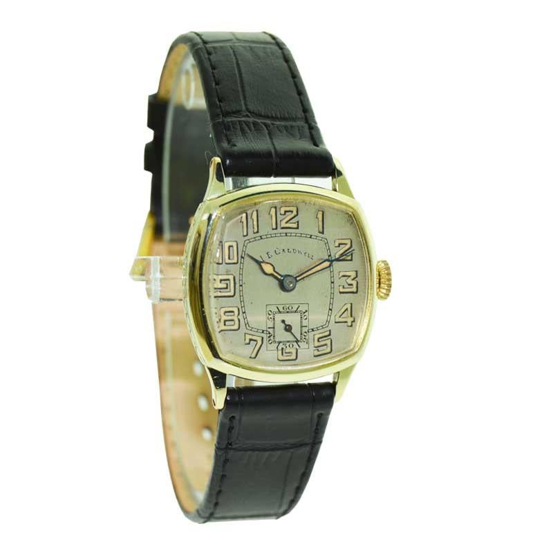 FACTORY / HOUSE: J.E. Caldwell
STYLE / REFERENCE: Cushion Shape
METAL / MATERIAL: Yellow Gold Filled
CIRCA / YEAR: 1920's
DIMENSIONS / SIZE: 34 mm X 27 mm
MOVEMENT / CALIBER: Manual Winding / 15 Jewels / Cal. 9 3/4
DIAL / HANDS: Original Silvered