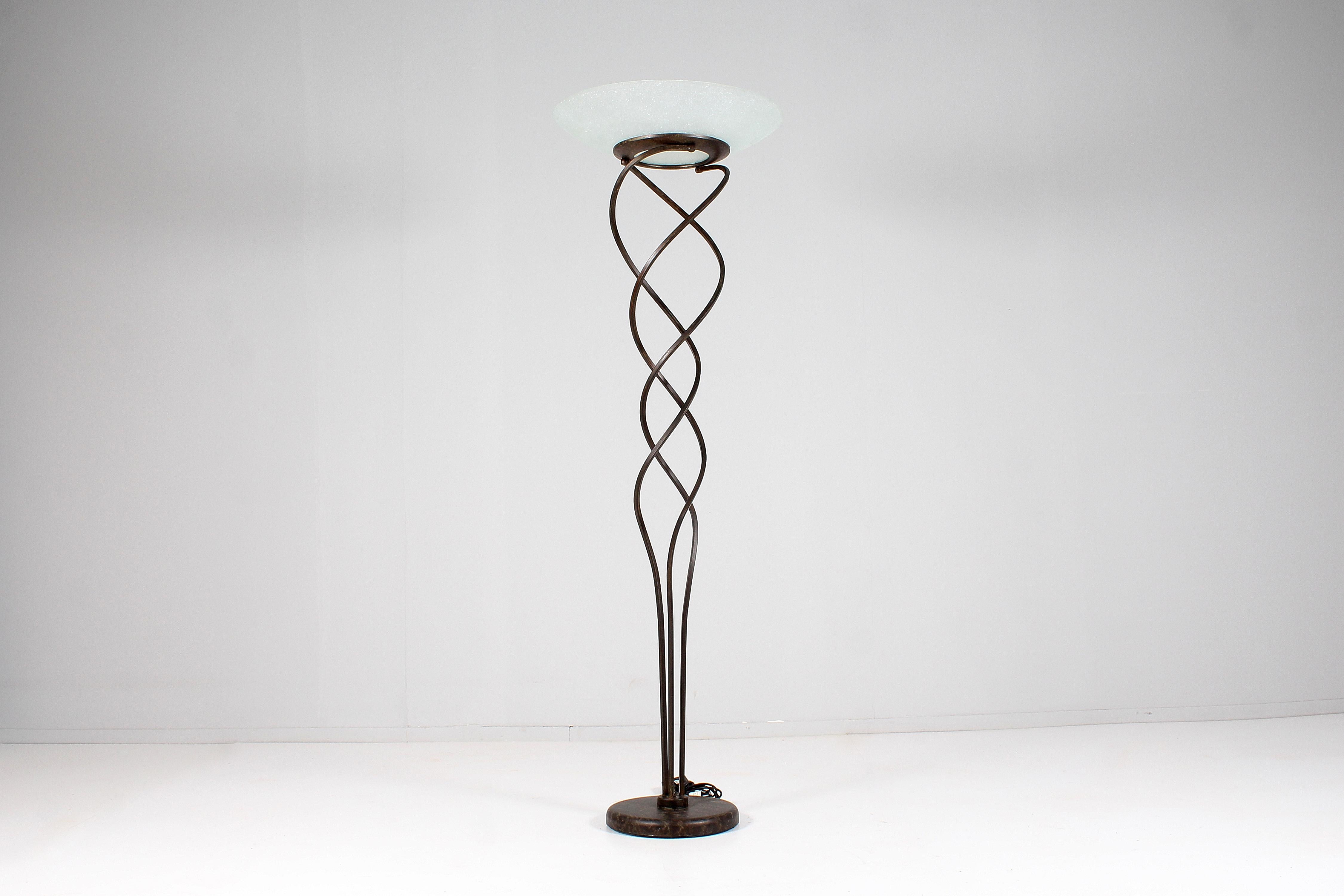 Very stylish floor lamp, wrought iron stem with turned square section, white sandblasted Murano glass diffuser, circular base. In the style of 