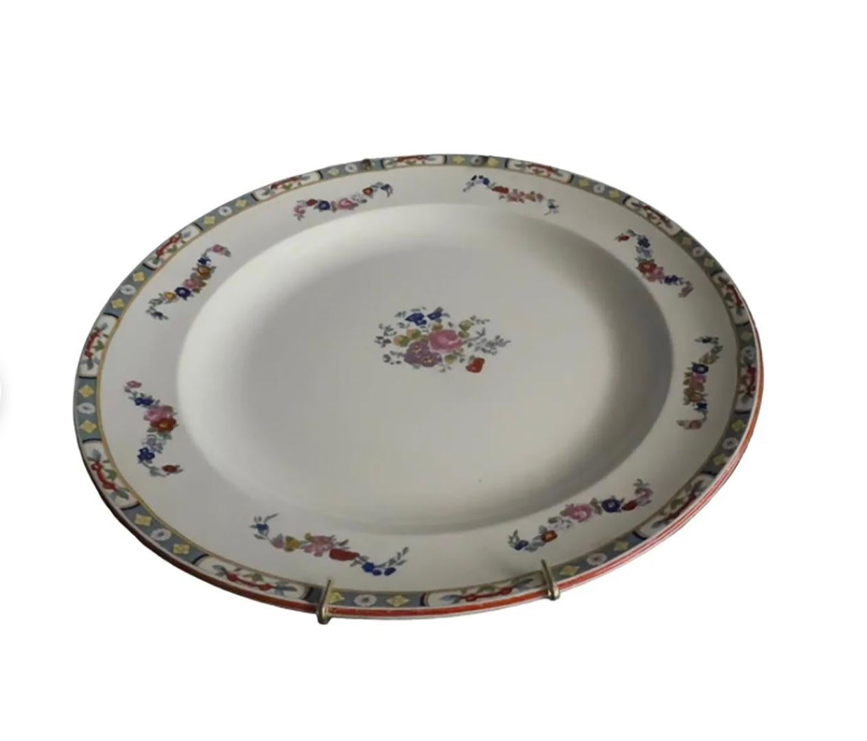 J & G Meakin Hanley England Richmond white round serving platter with floral patter. No mark on back.