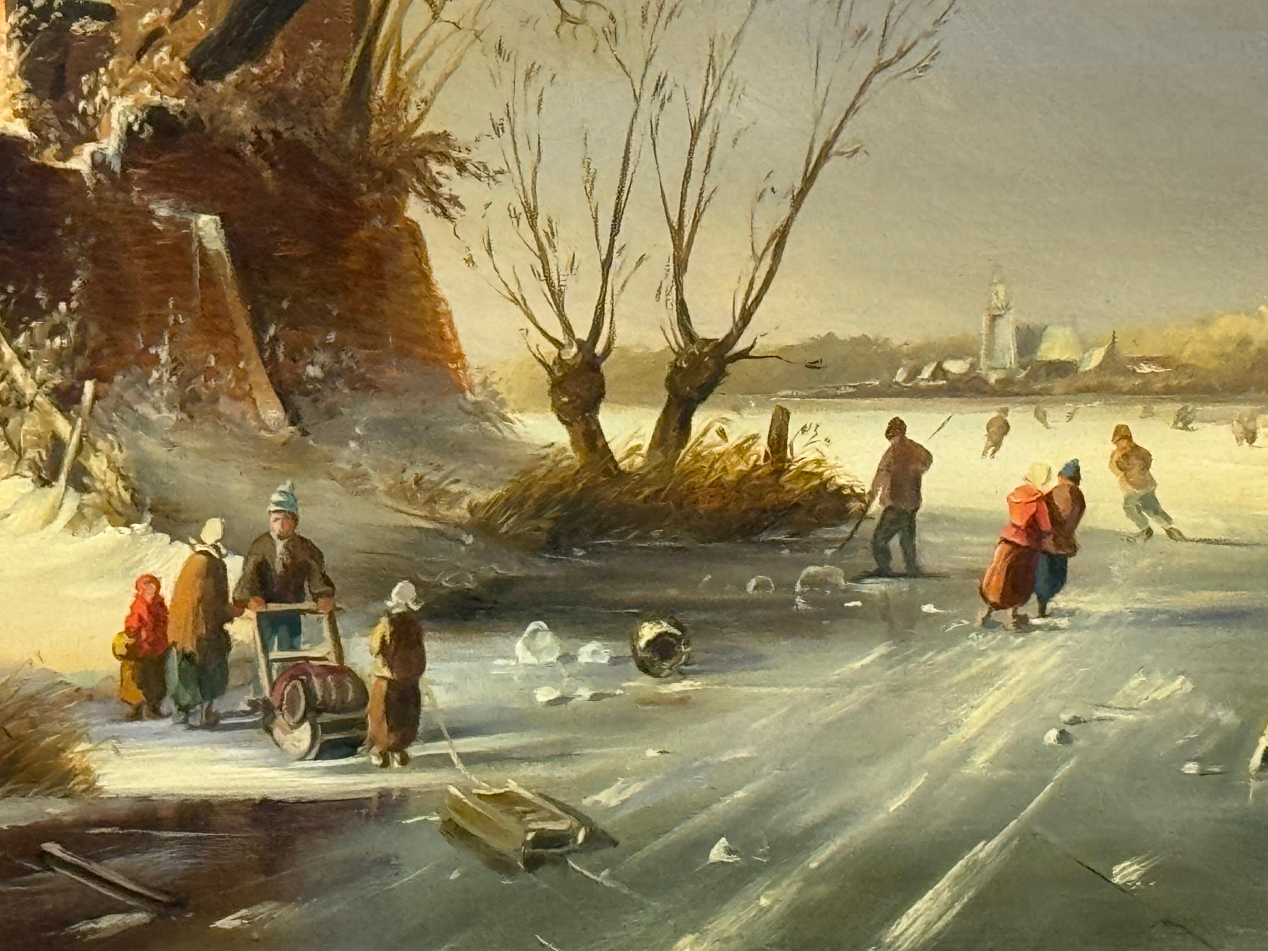 Escena navideña invernal de figuras patinando sobre un lago helado en un pueblo holandés en venta 2