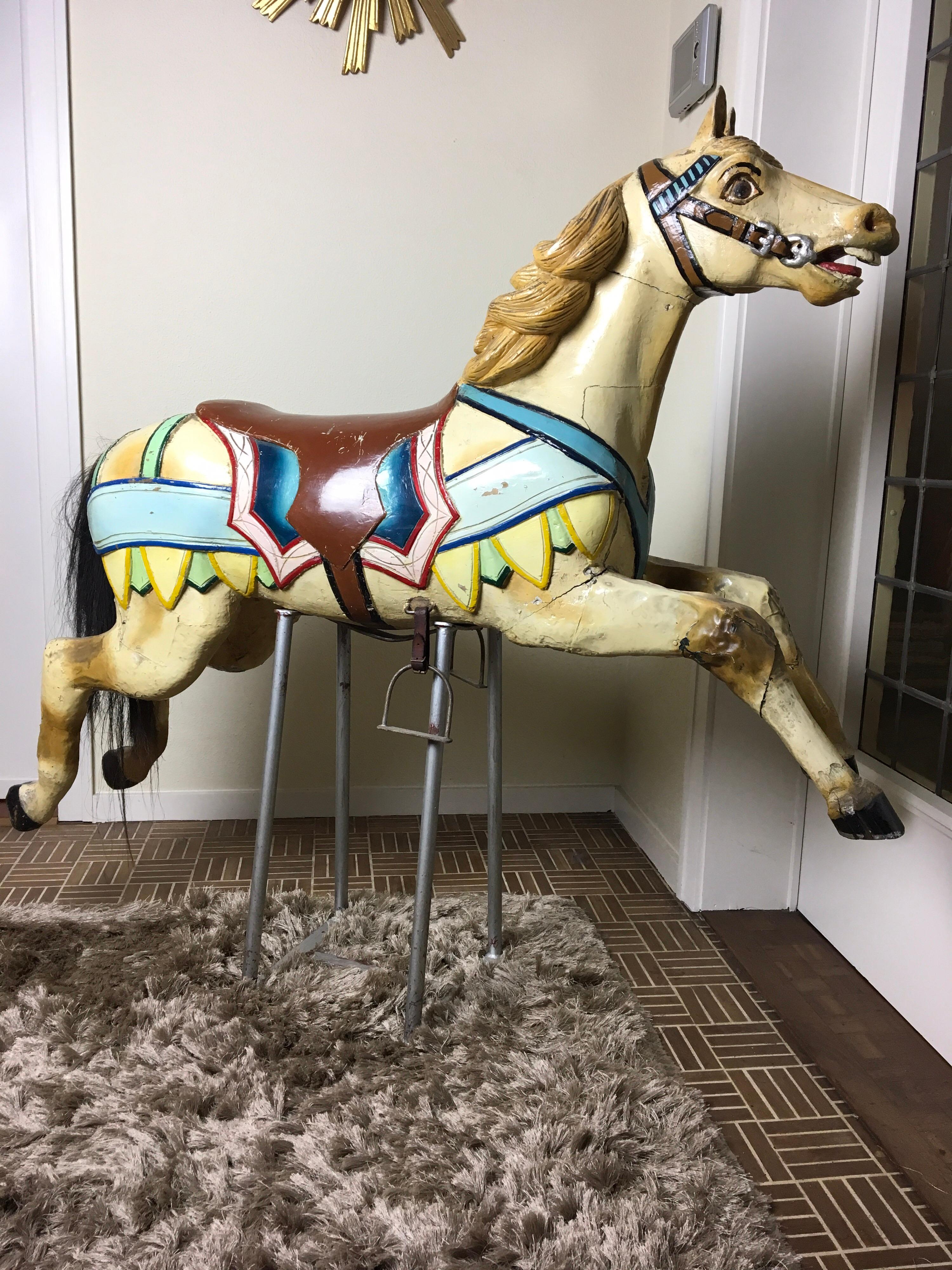 Antique Carousel horse by J.Hübner. 
A hand-carved wooden carousel horse made by Atelier Hübner Germany - Josef Hübner - Joseph Hubner. 
This piece of Carnival Art - funfair roundabout horse - Merry-go-round Horse 
dates circa 1910 and has sulfide