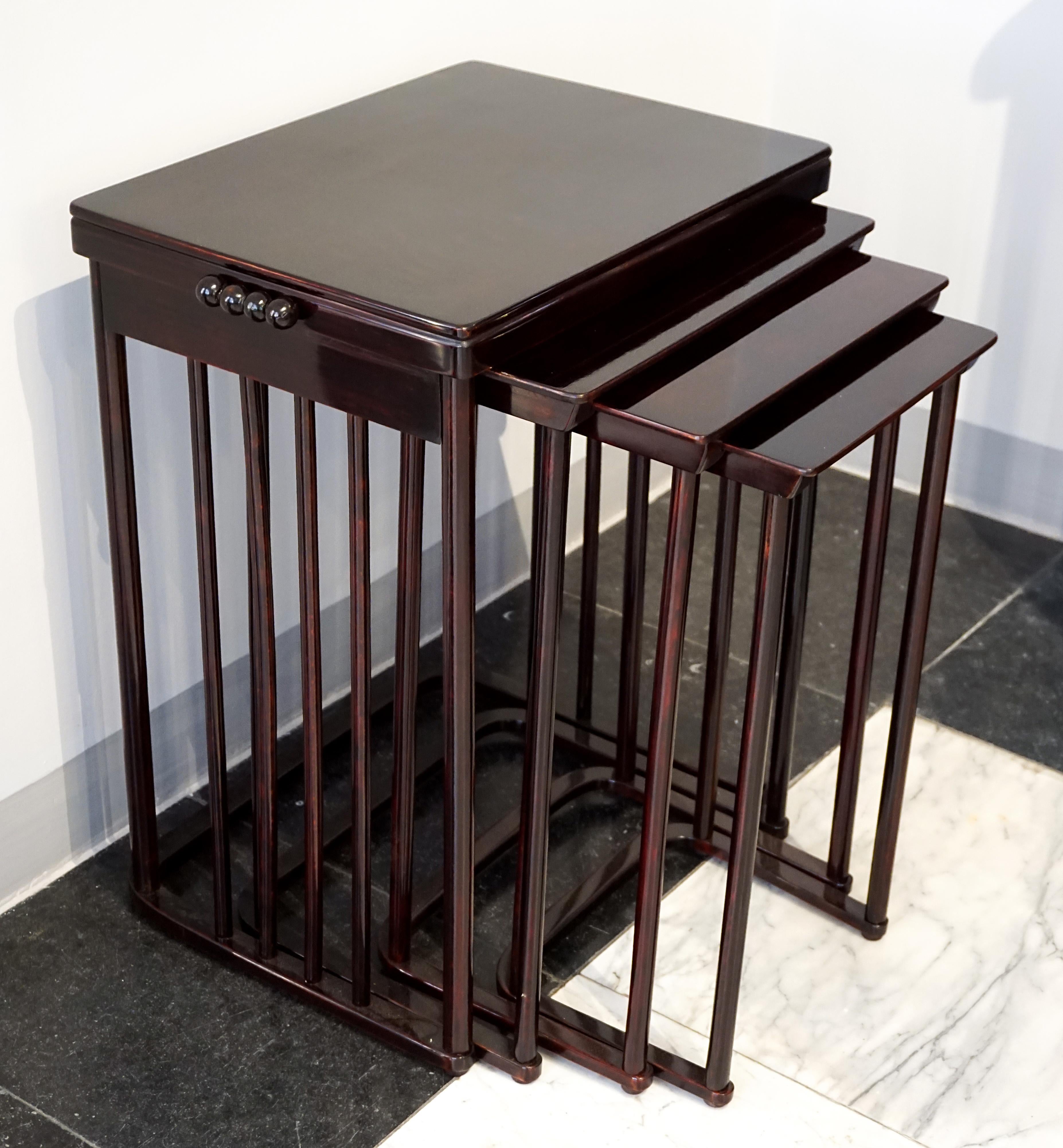 Elegant Art Nouveau side table set consisting of four individual tables of different sizes that can be nested inside each other, first appearing in the Kohn catalogue of 1906. The attribution became known after the publication of the 986 tables in