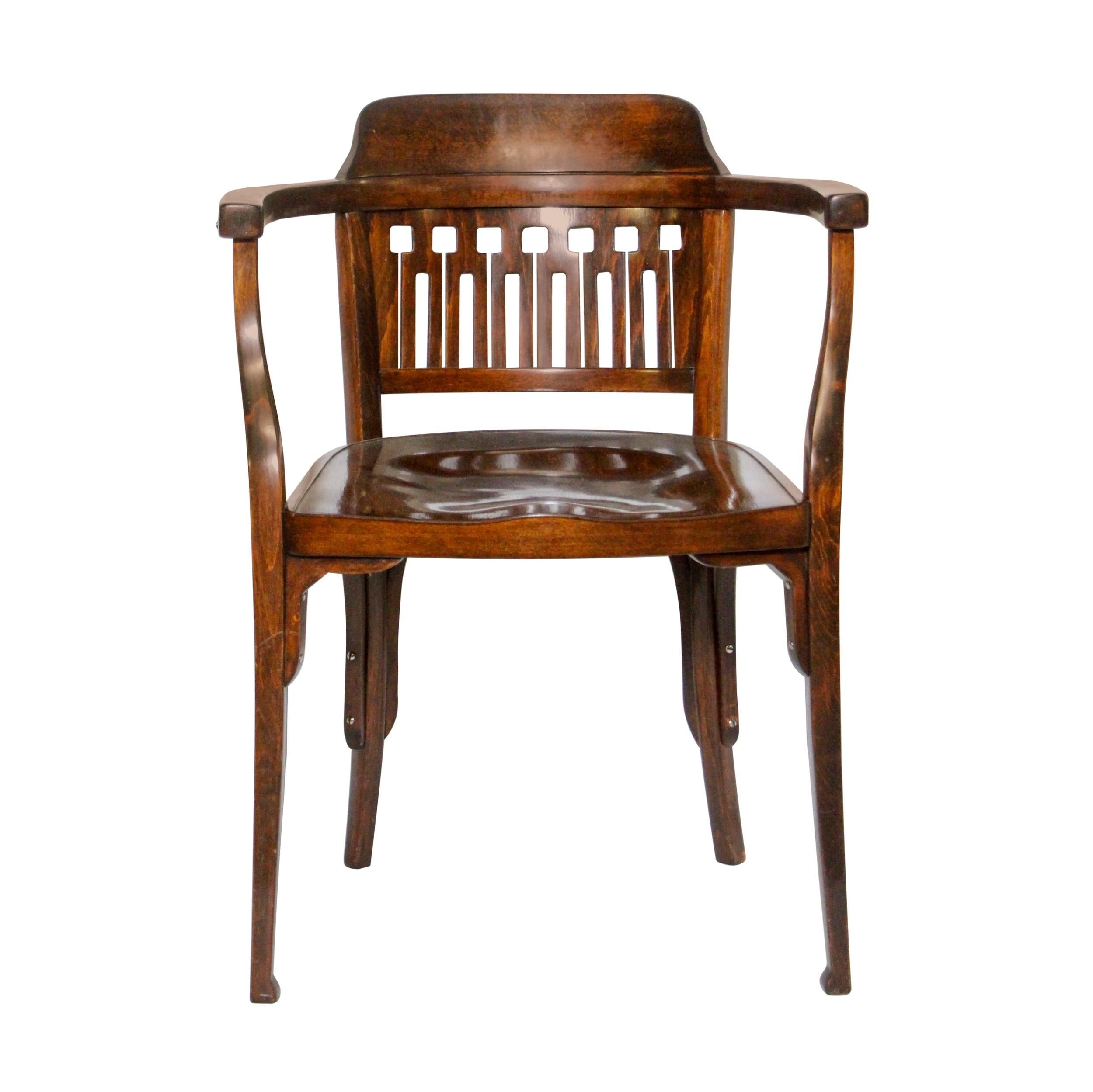 Early 1900's authentic Vienna Secession Bauhaus bentwood armchair. This chair was manufactured by Jacob & Josef Kohn (J. & J. Kohn) from 1905-1915 in Vienna, Austria. There is a stamp under the seat showing manufacturers name (please see photo). It