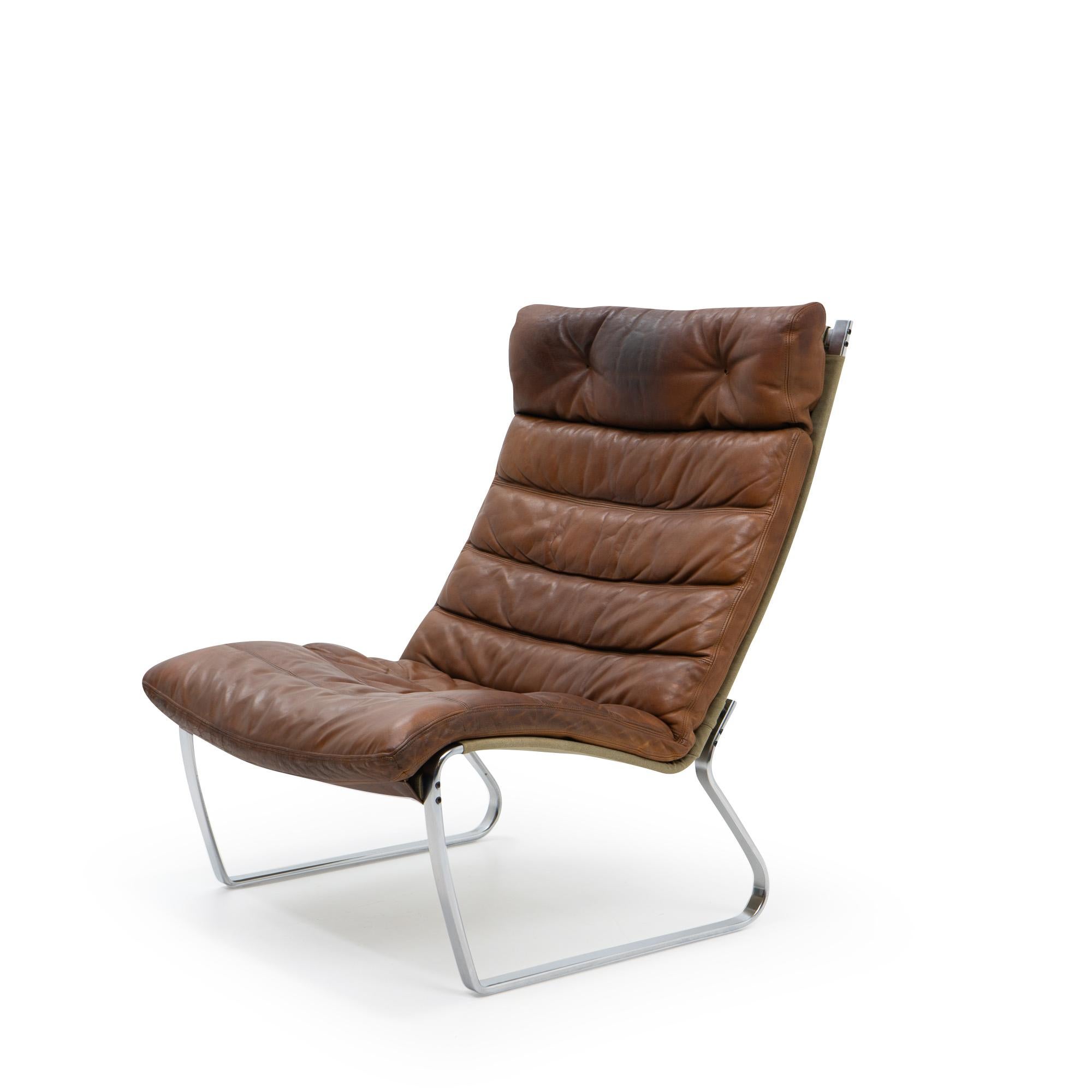 JK 720 Lounge Chair by Jørgen Kastholm for Kill International: 

The JK 720 Chair was only produced for a short time during the 1970s by Alfred Kill’s company; it features a brushed steel frame, canvas support and a beautifully patinated leather