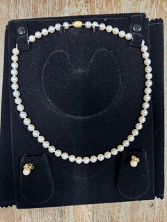 J KÖHLE(JKA)Pforzheim 18kt Gold Clasp Pearl Necklace with matching 18k earrings.