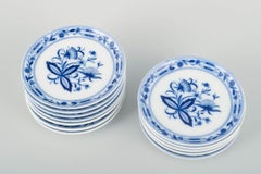 J. Kronester, Germany. Set of 12 small plates with the classic floral motif.