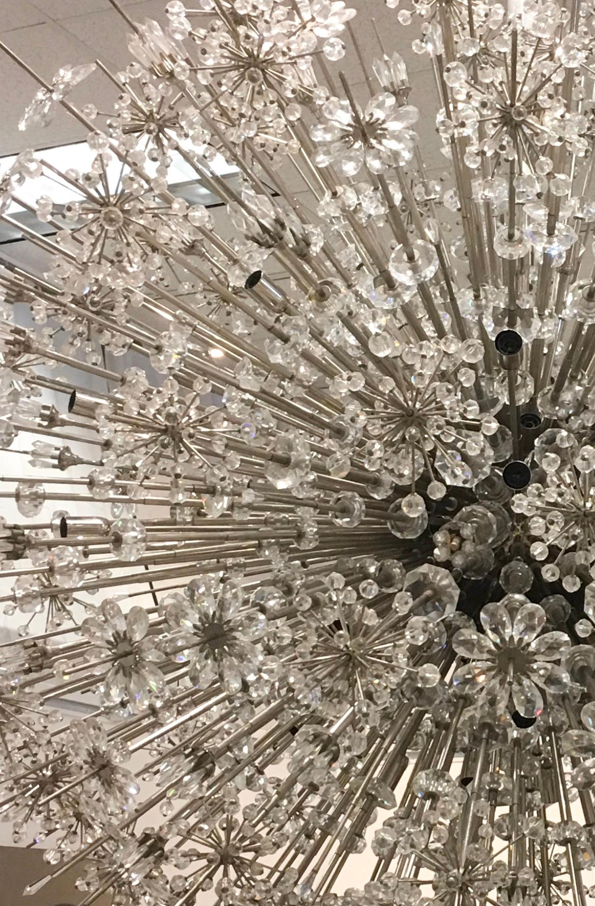 Amazing Monumental Sputnik Chandelier by J. & L. Lobmeyr, 1960s, as seen in the Metropolitan Opera House fixtures. Chrome and enameled steel with Swarovski crystals.