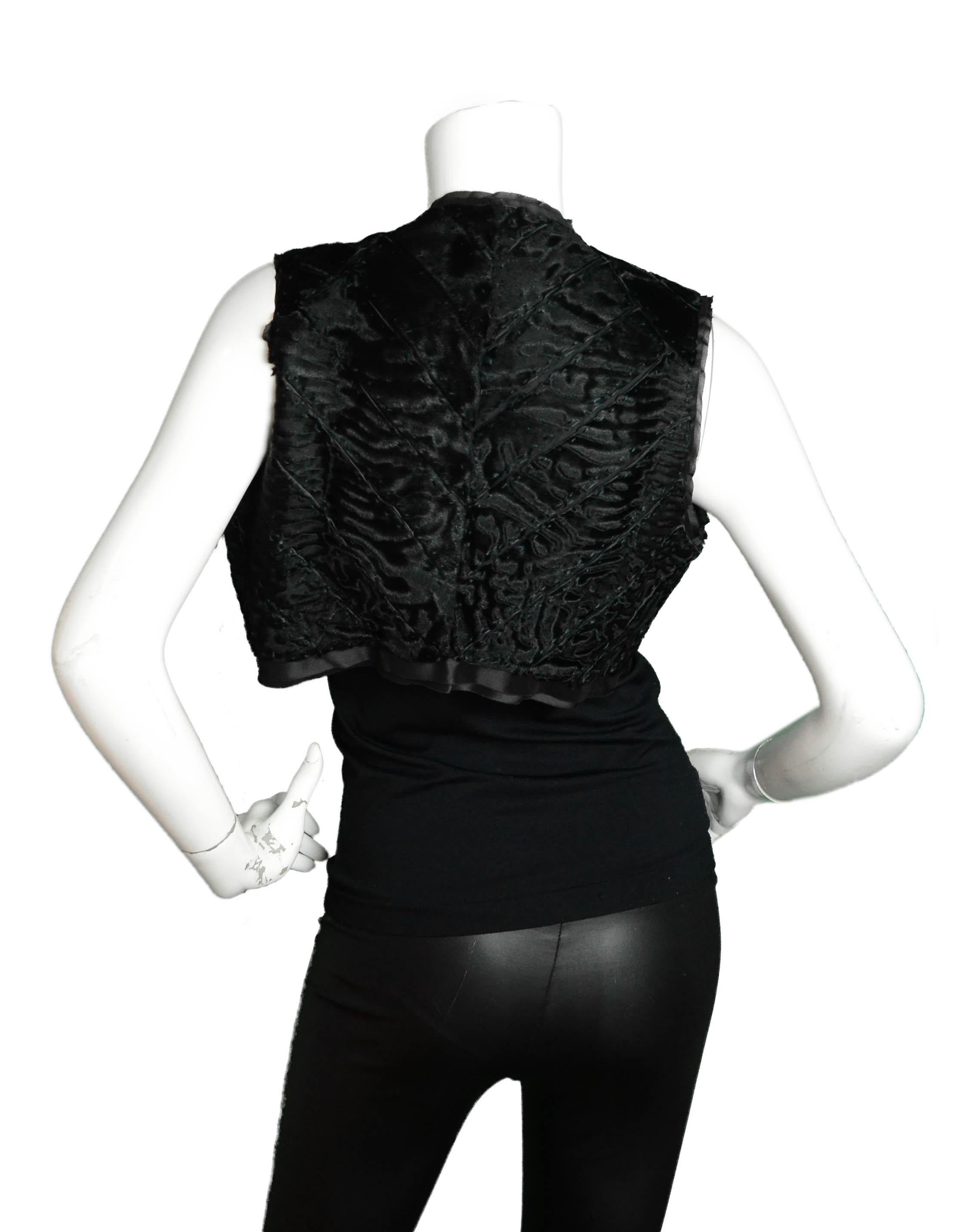 J. Mendel Black Persian Lamb Patchwork Cropped Vest

Made In: France
Color: Black
Materials: Persian Lamb
Lining: Silk
Overall Condition: Excellent

Tag Size: Missing tag *Please refer to measurements to ensure fit
Shoulder To Shoulder: 13.5” 
Bust: