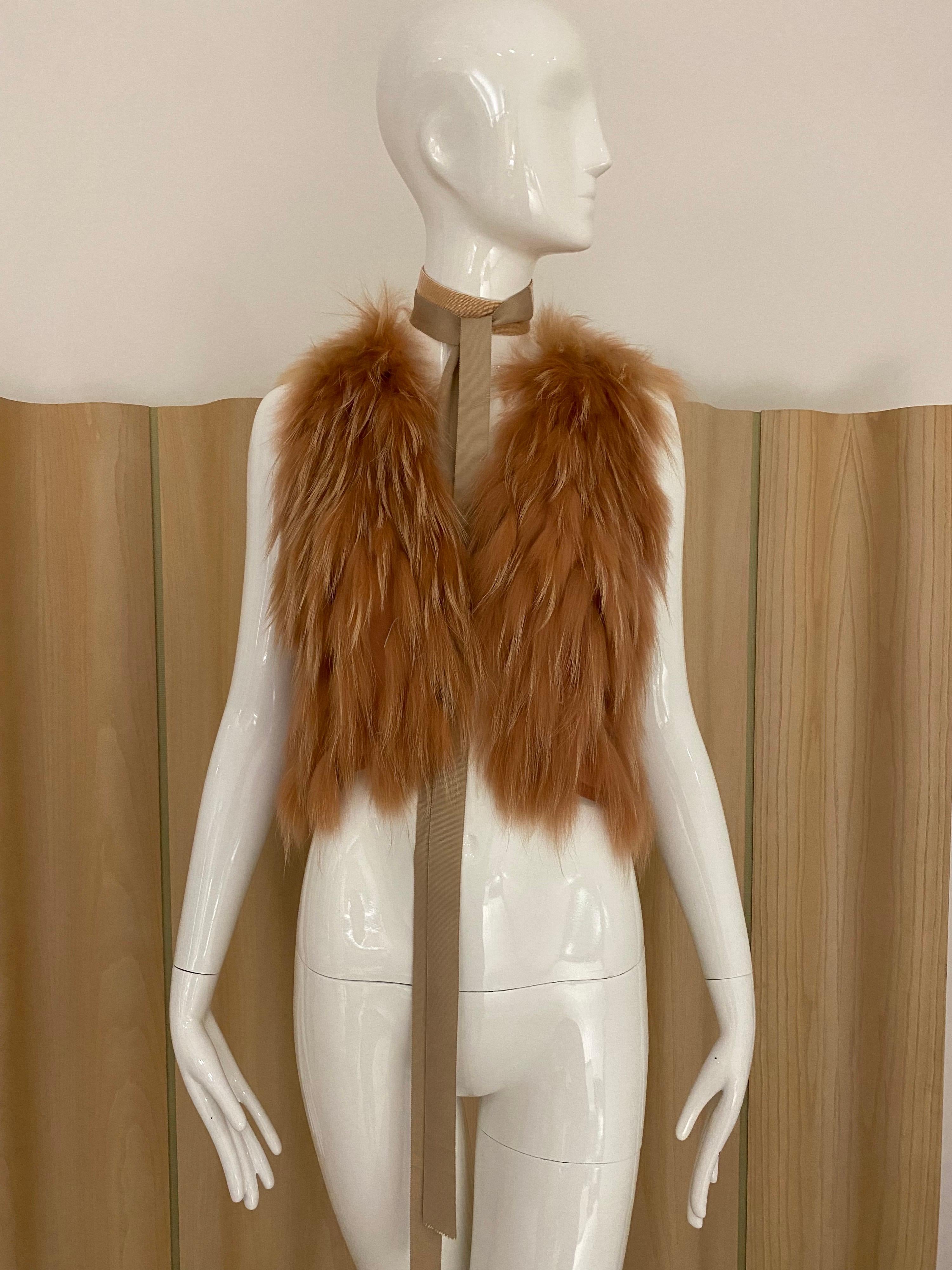J Mendel light orange fur vest with belt .
Fit size 0/2/4 / Small
