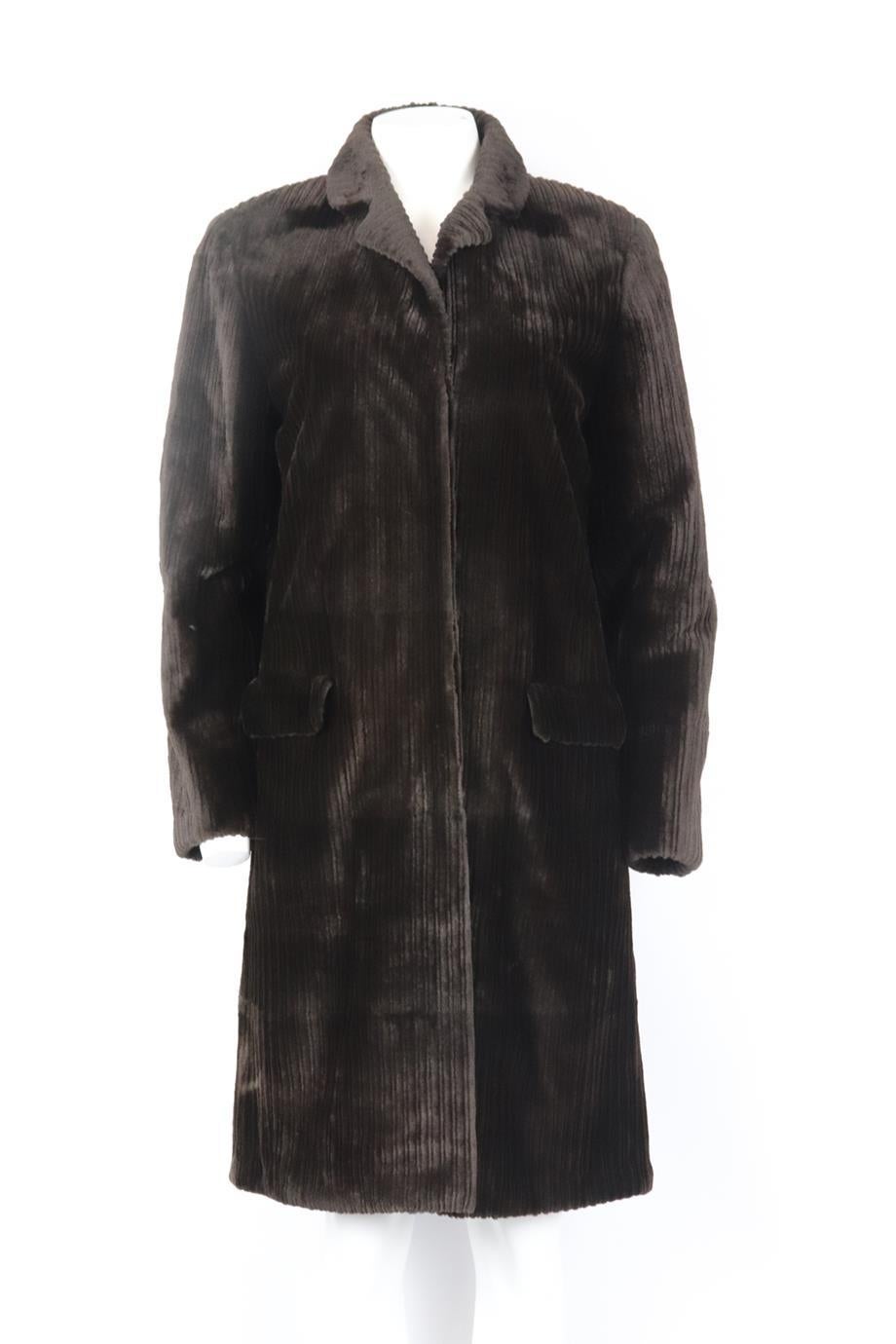 J. Mendel sheared mink fur coat. Brown. Long sleeve, v-neck. Button fastening at front. Size: US 8 (UK 12, FR 40, IT 44). Shoulder to shoulder: 15 in. Bust: 36 in. Waist: 38 in. Hips: 40 in. Length: 39 in. Very good condition - Composition label cut