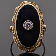 Onyx and Diamond 14 Karat Yellow Gold Ring